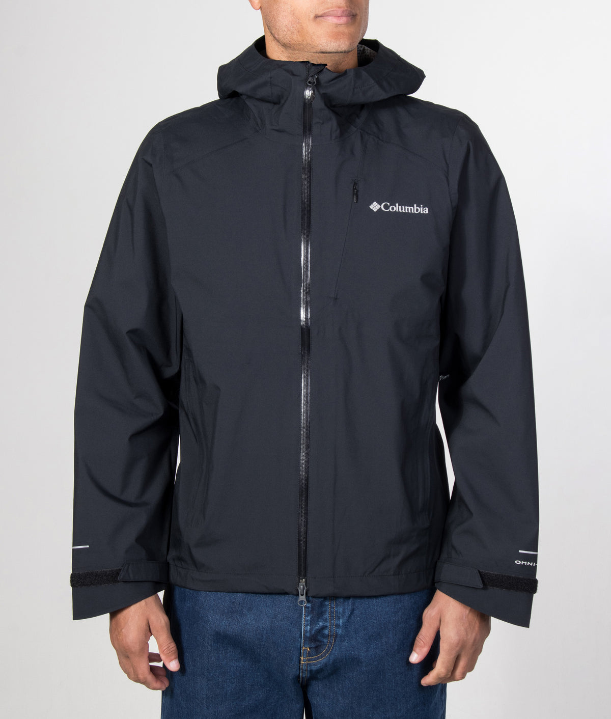 Columbia Trailborne™ 2.5L Packable Waterproof Jacket in Black at EQVVS Menswear. Front model shot.