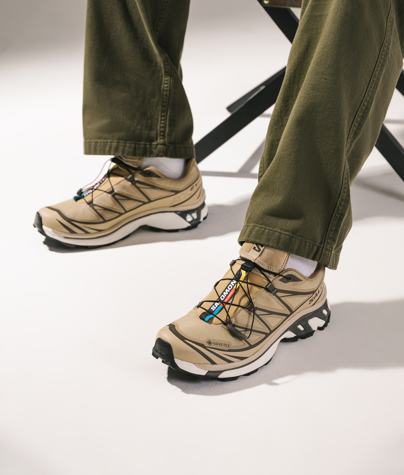 Salomon XT-6 GTX Sneakers in Kelp/Wren/Safari at EQVVS Menswear. Campaign shot.