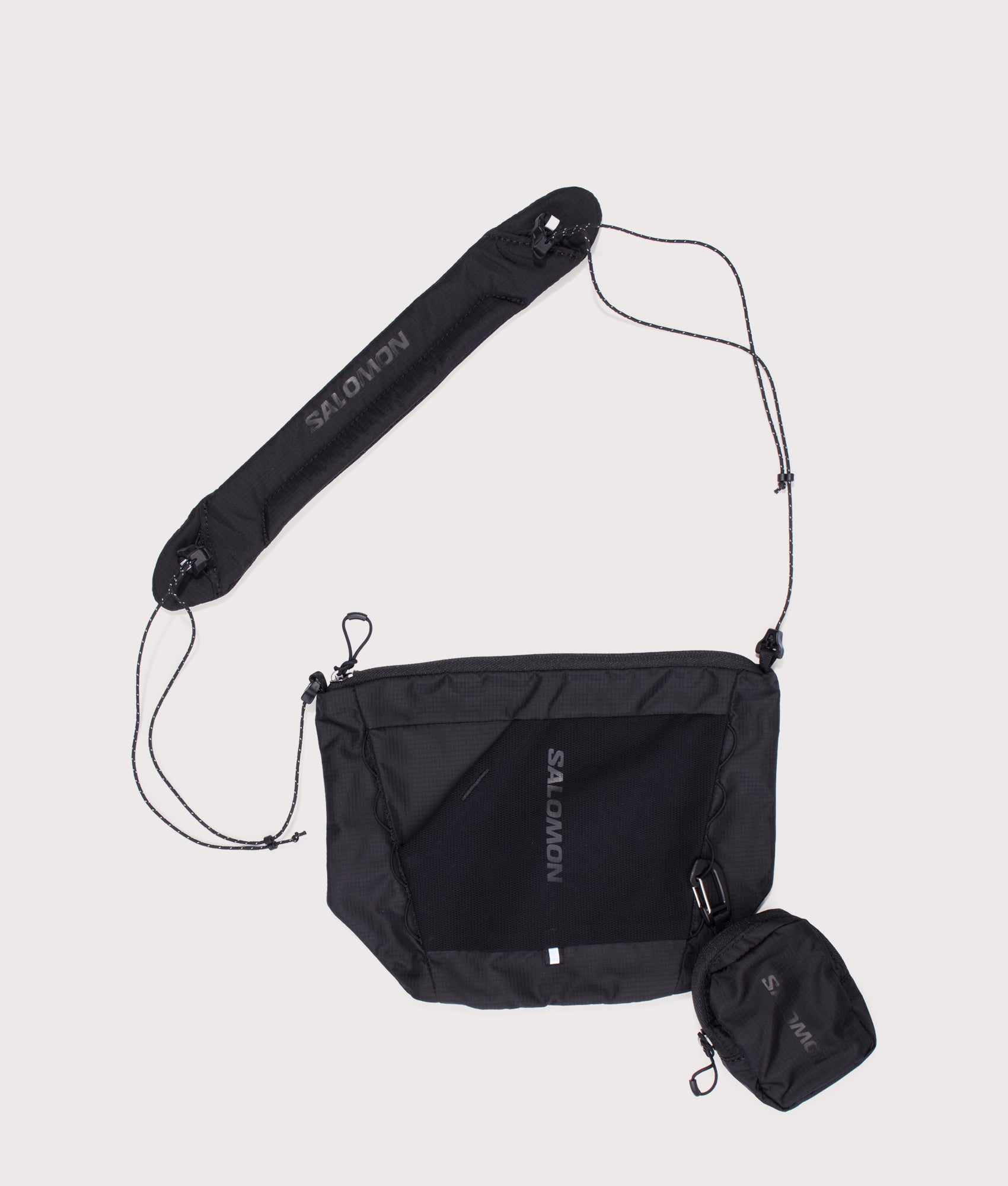 Salomon ACS 2 REVISED Crossbody Bag in Black at EQVVS Menswear. Front shot.