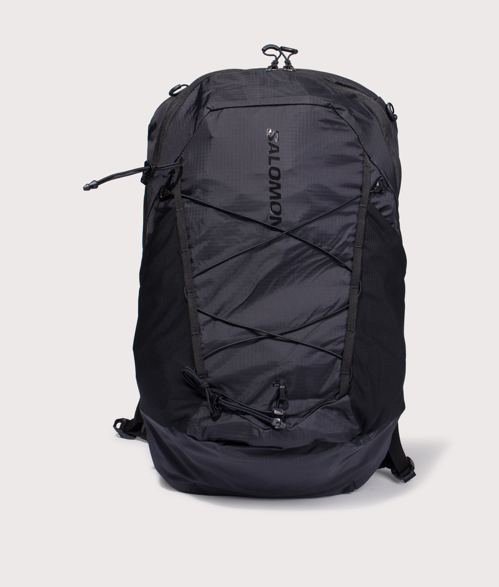 Salomon XT 15 Backpack in black at EQVVS Menswear. Front shot.