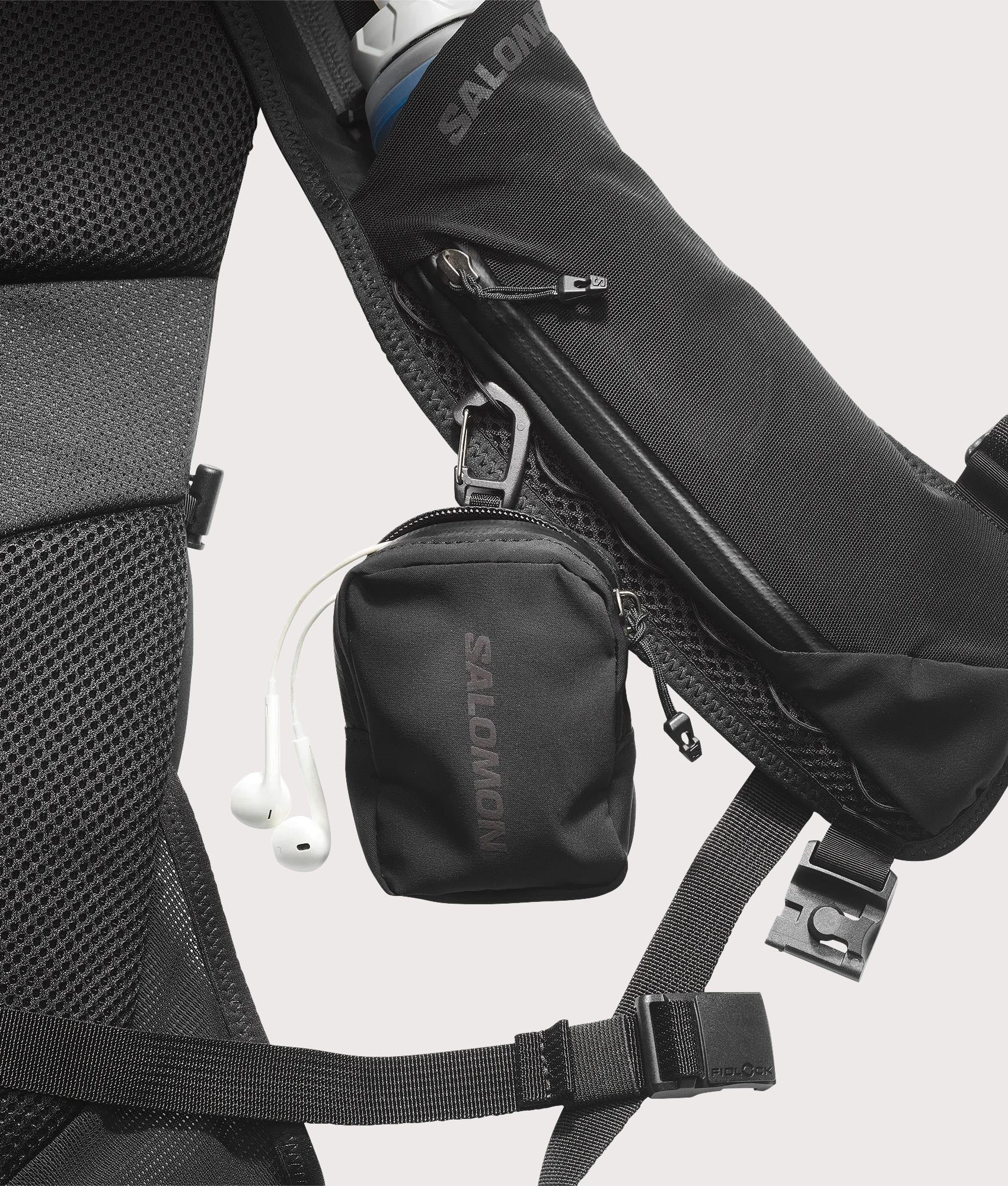 SALOMON Adv Crossbody Bag in Black at EQVVS Menswear. Detail shot.