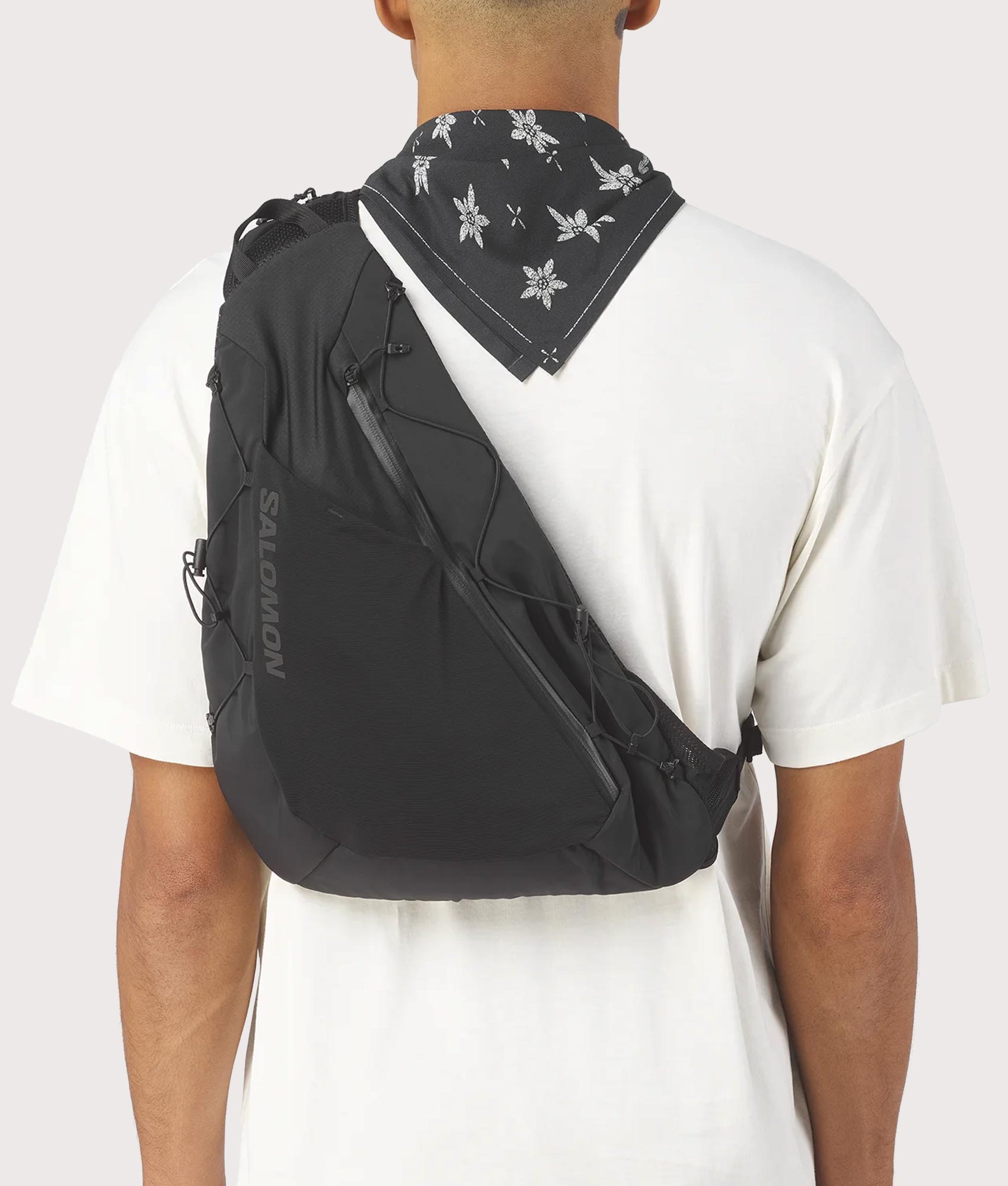 SALOMON Adv Crossbody Bag in Black at EQVVS Menswear. Model back shot.