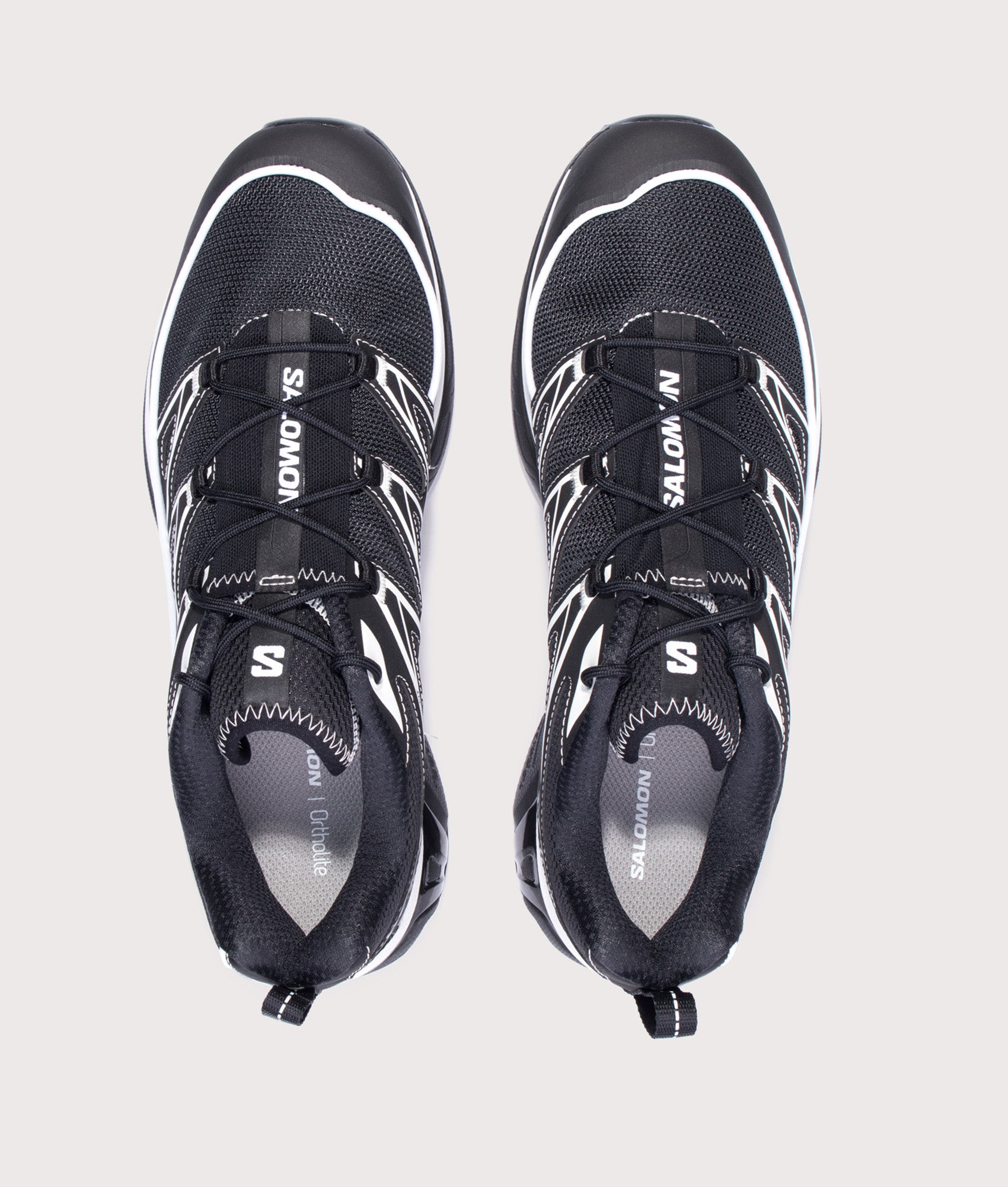 SALOMON XT-6 EXPANSE Sneakers in Black, Black and White at EQVVS Menswear. Top shot.