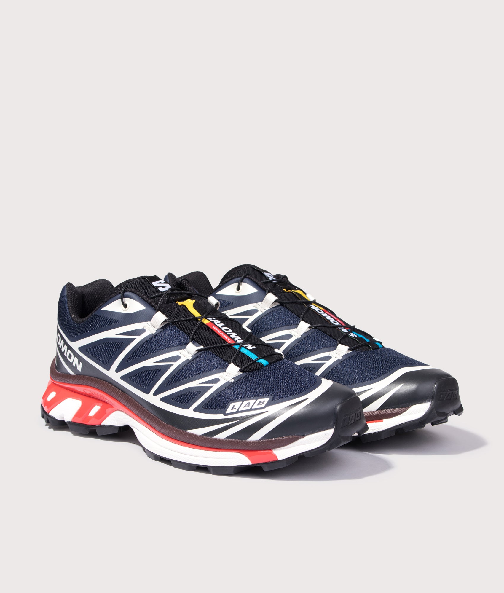 SALOMON XT-6 in Blue, Black and Fiery Red at EQVVS Menswear. Angled front shot.