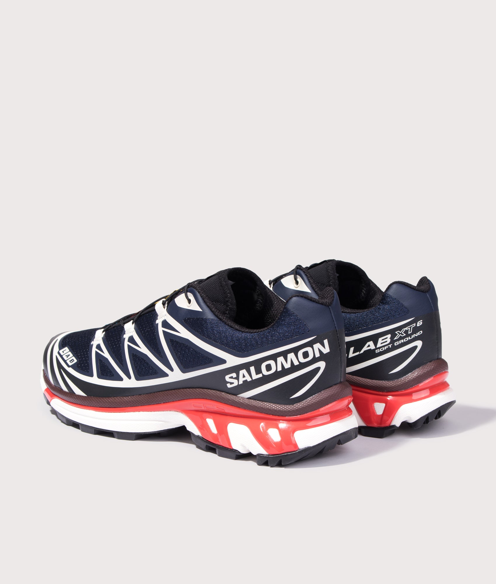 SALOMON XT-6 in Blue, Black and Fiery Red at EQVVS Menswear. Angled back shot.