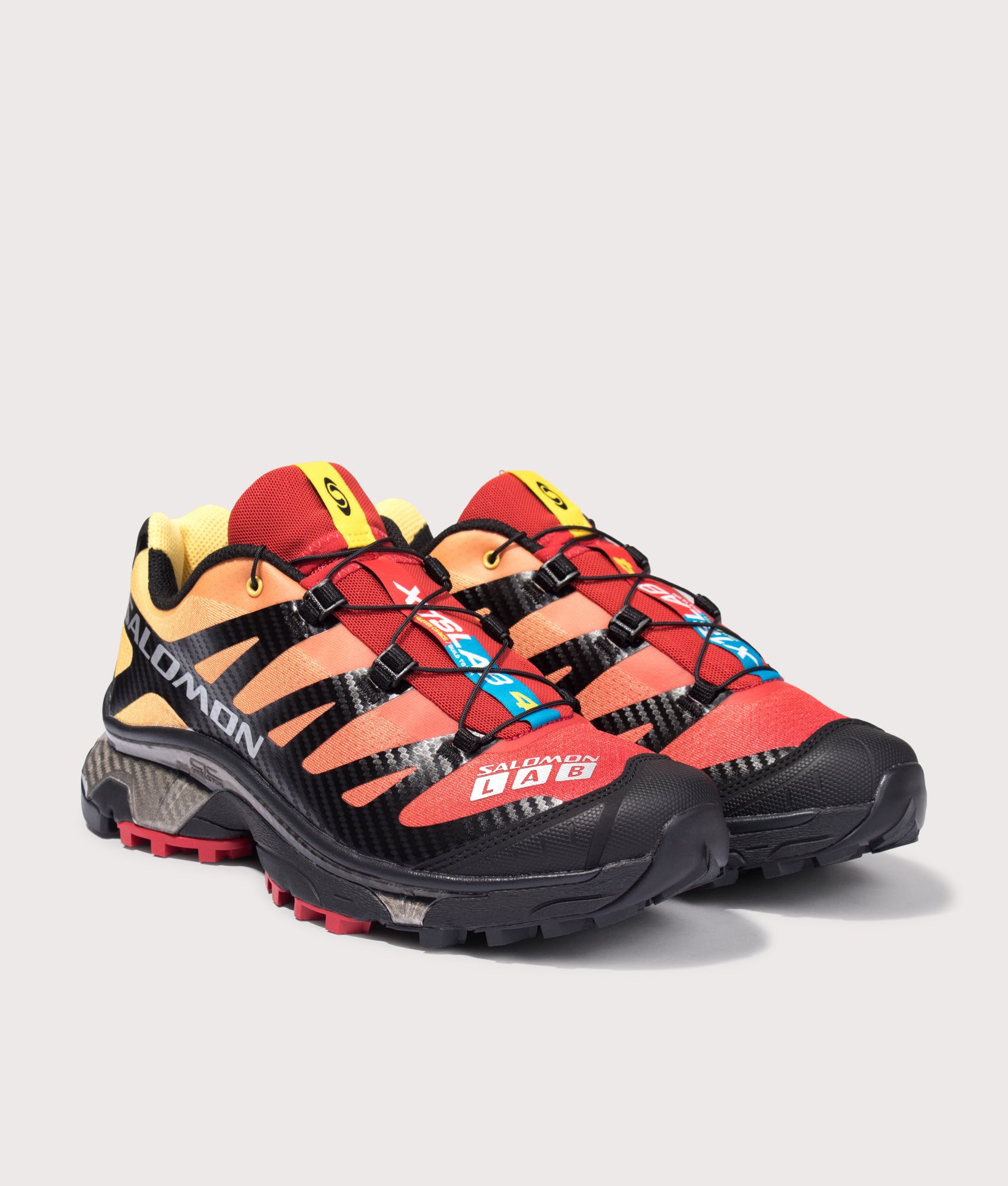 Salomon XT-4 OG in Lava Falls/Beach Ball/Black at EQVVS Menswear. Angled front shot.