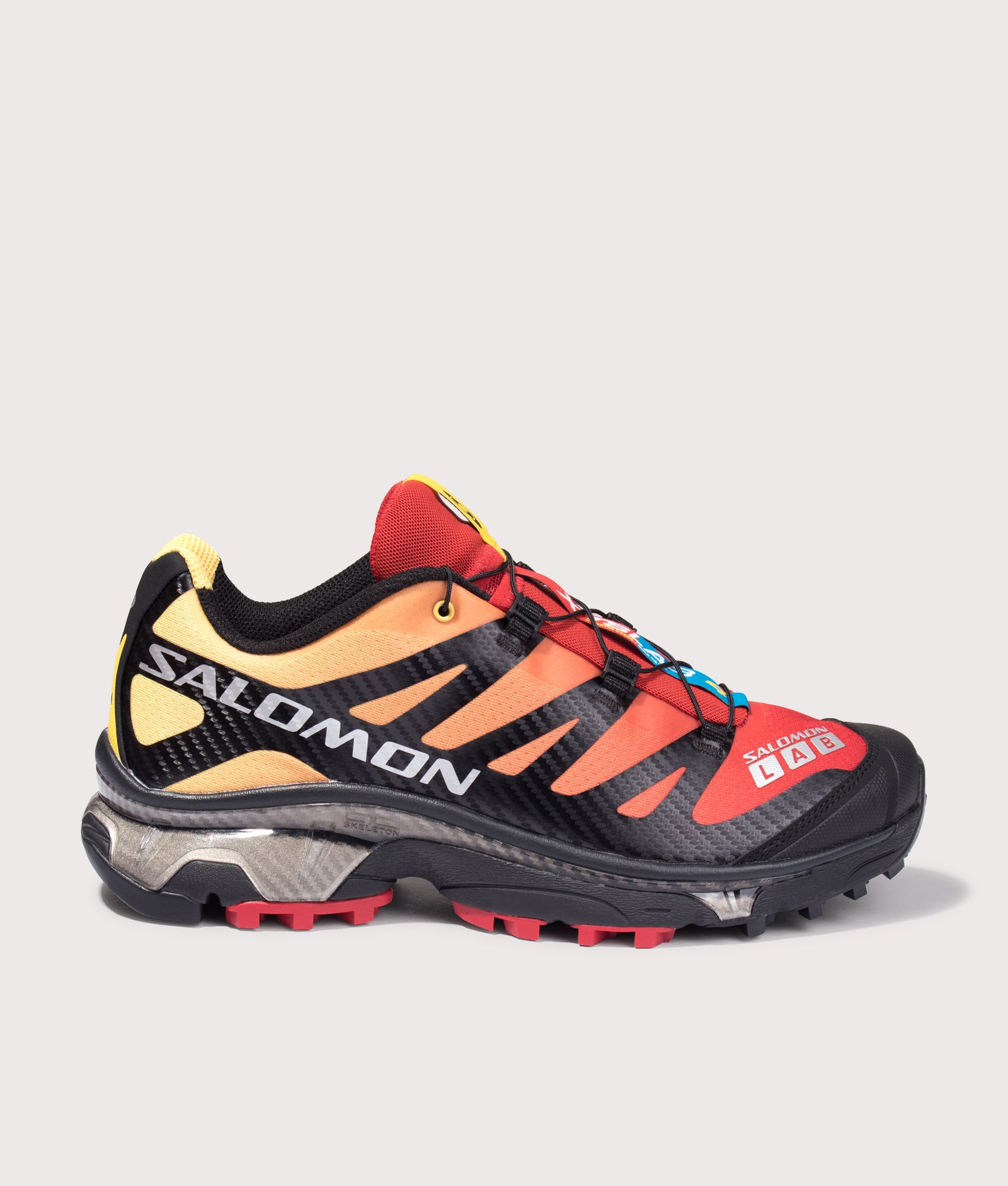 Salomon XT-4 OG in Lava Falls/Beach Ball/Black at EQVVS Menswear. Side shot.