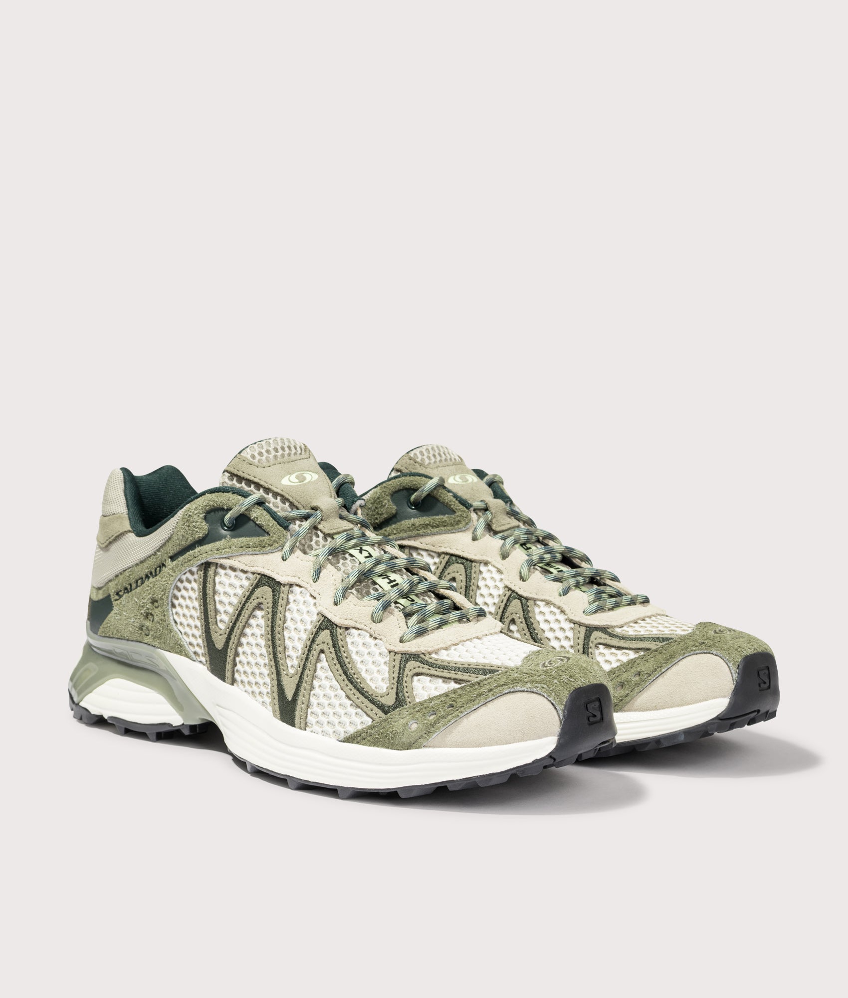 Salomon XT-WHISPER EMBROIDERY in Deep Lichen Green, Eucalyptus and Butterfly at EQVVS Menswear. Angled front shot.
