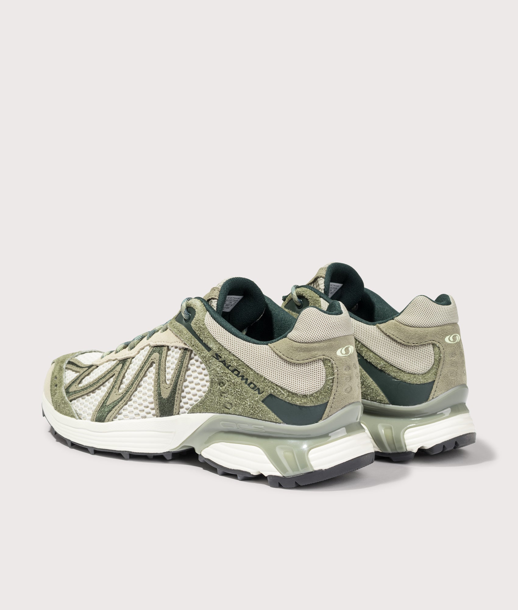 Salomon XT-WHISPER EMBROIDERY in Deep Lichen Green, Eucalyptus and Butterfly at EQVVS Menswear. Angled back shot.