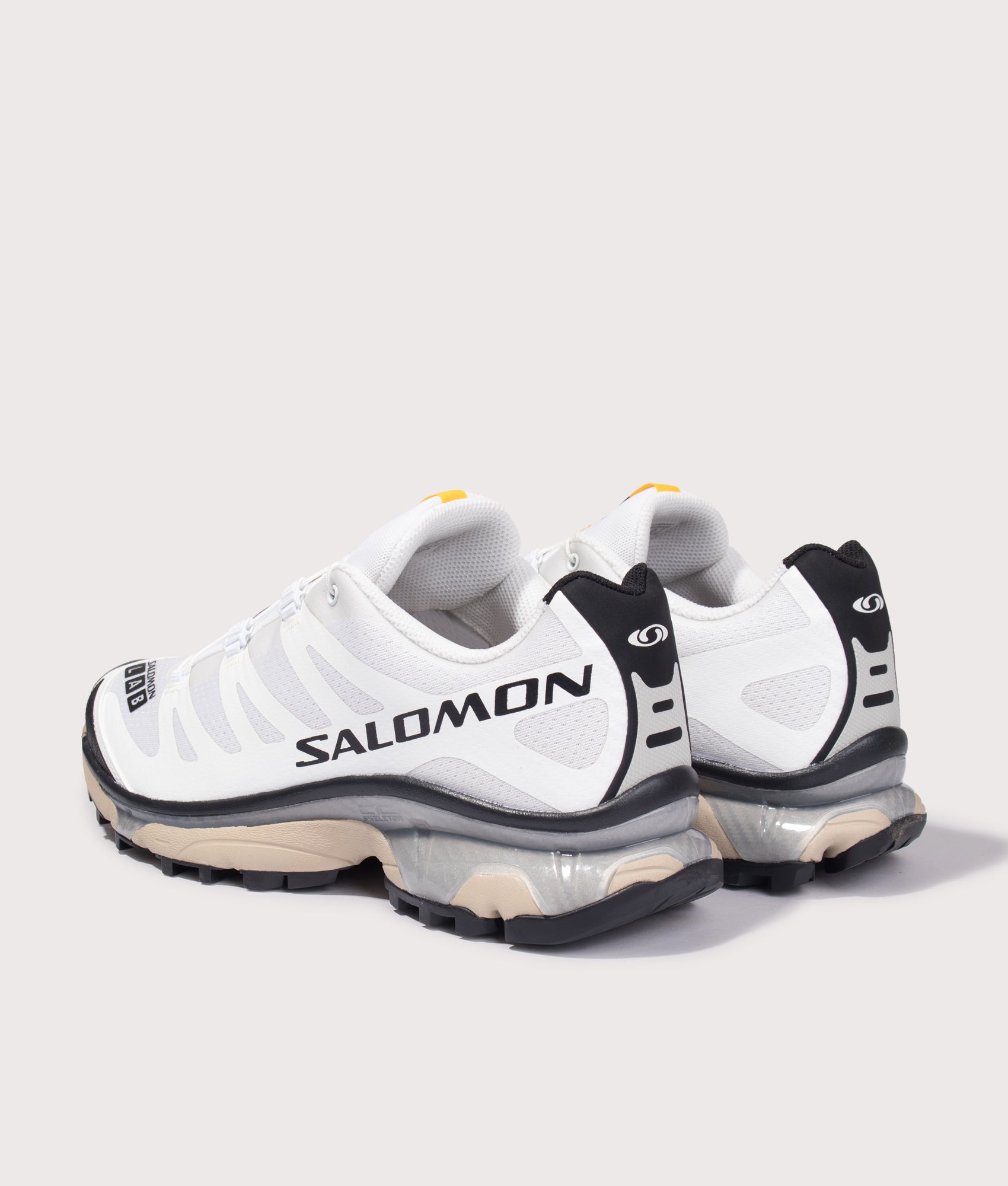 Salomon XT-4 OG in White/Black/White Pepper at EQVVS Menswear. Angled back shot.