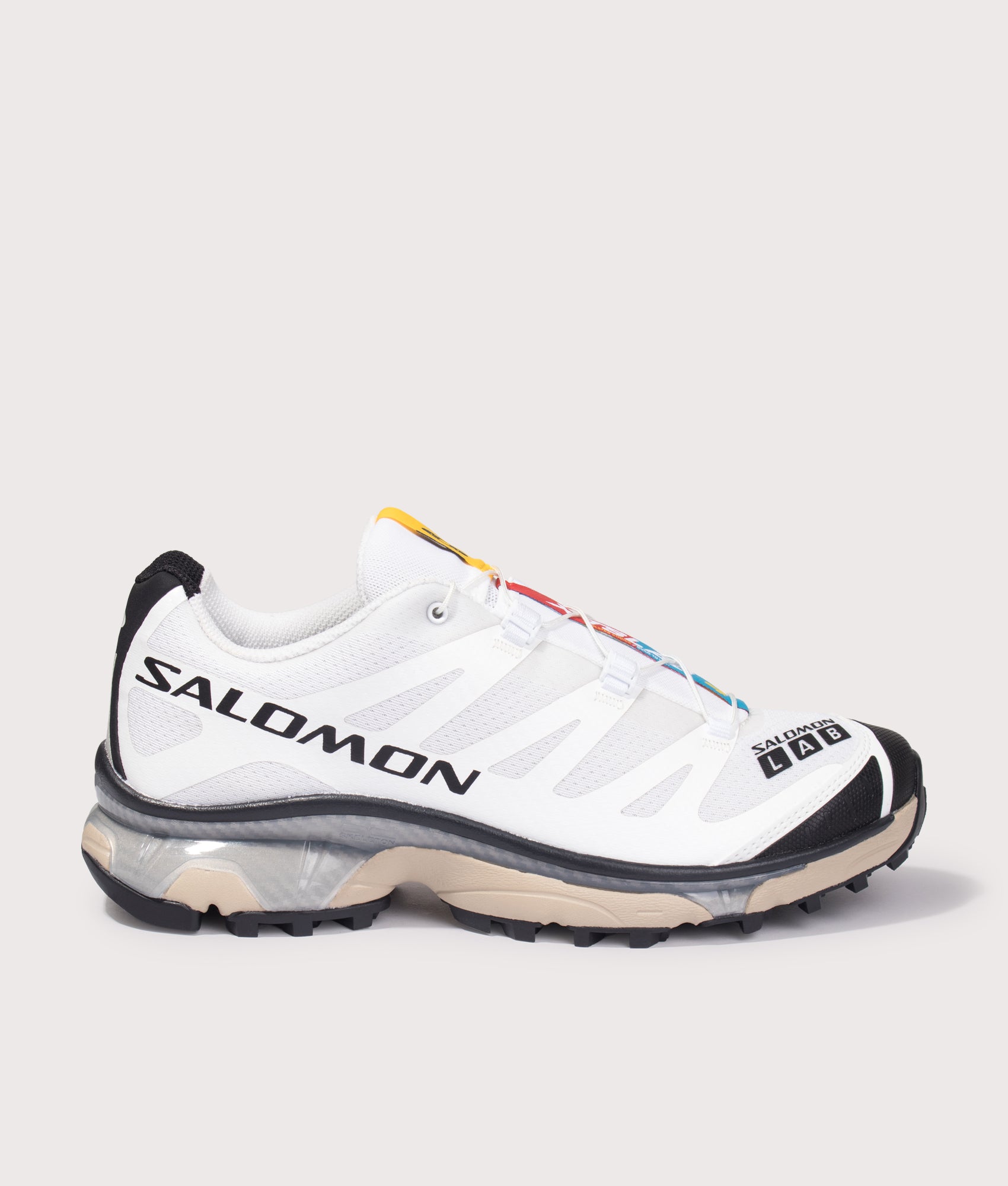Salomon XT-4 OG in White/Black/White Pepper at EQVVS Menswear. Side shot.