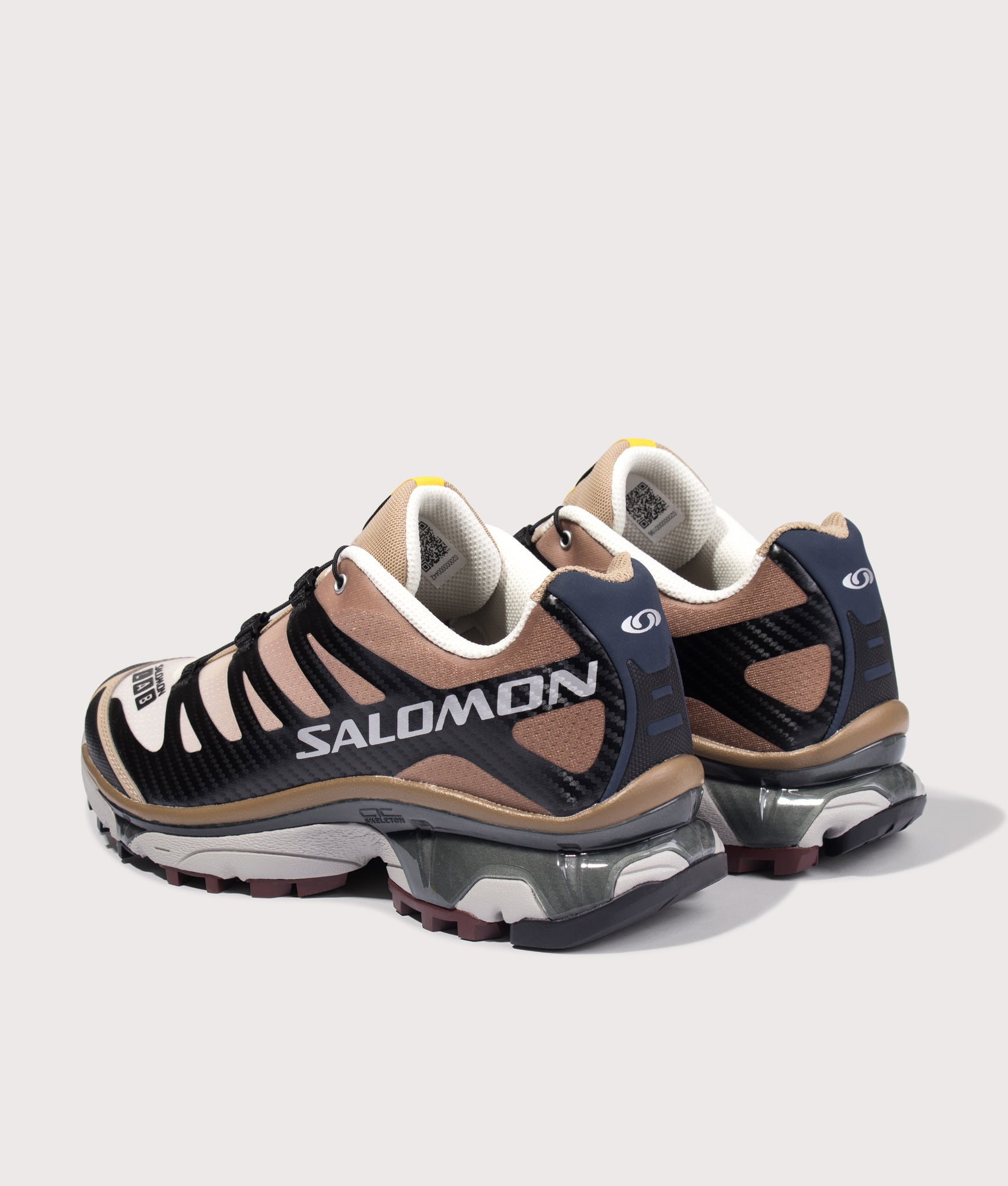 Salomon XT-4 OG in Black, Desert Tan and Vanila at EQVVS Menswear. Angled back shot.