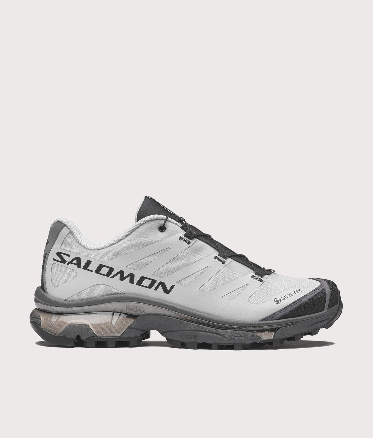 SALOMON XT-4 OG GTX Sneakers in Pearl blue, Asphalt and Black at EQVVS Menswear. Side shot.