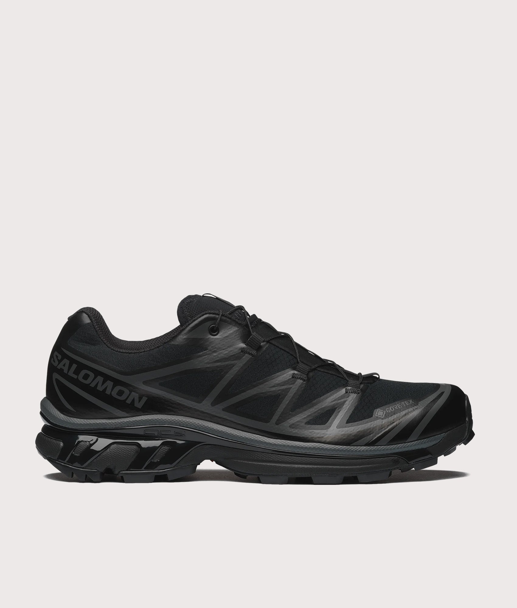 SALOMON XT-6 GTX Sneakers in Black and Asphalt at EQVVS Menswear. Side shot.