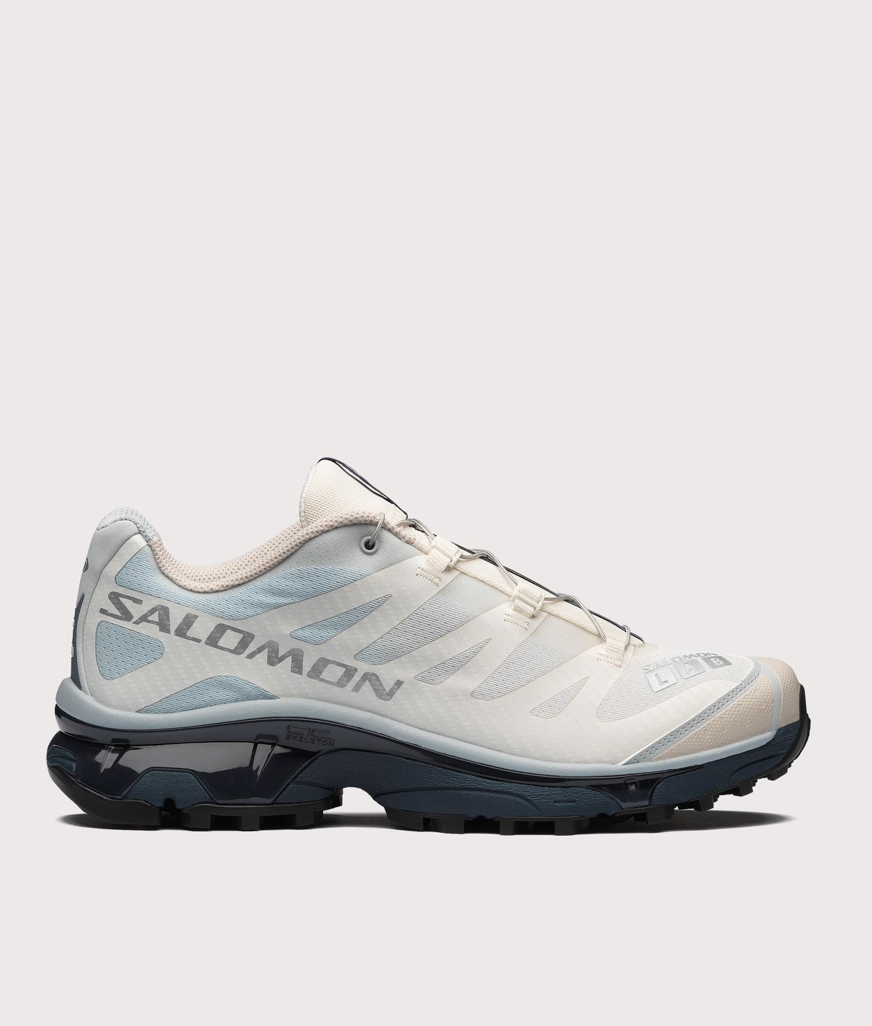 Salomon XT-4 OG in Pearl Blue, Grisaille and Vanila at EQVVS Menswear. Side shot.