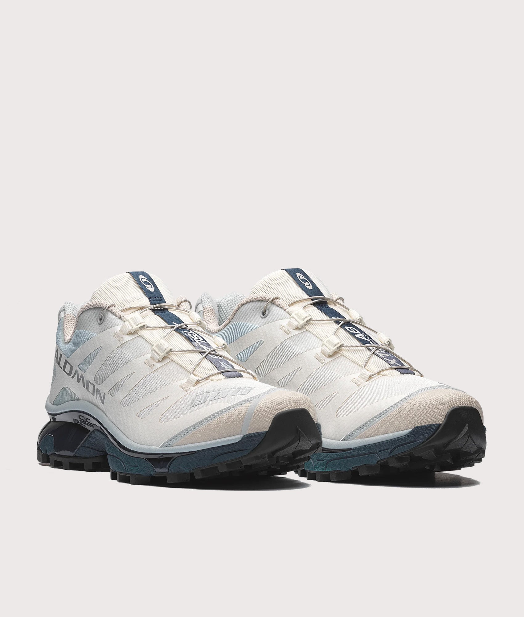 Salomon XT-4 OG in Pearl Blue, Grisaille and Vanila at EQVVS Menswear. Angled front shot.