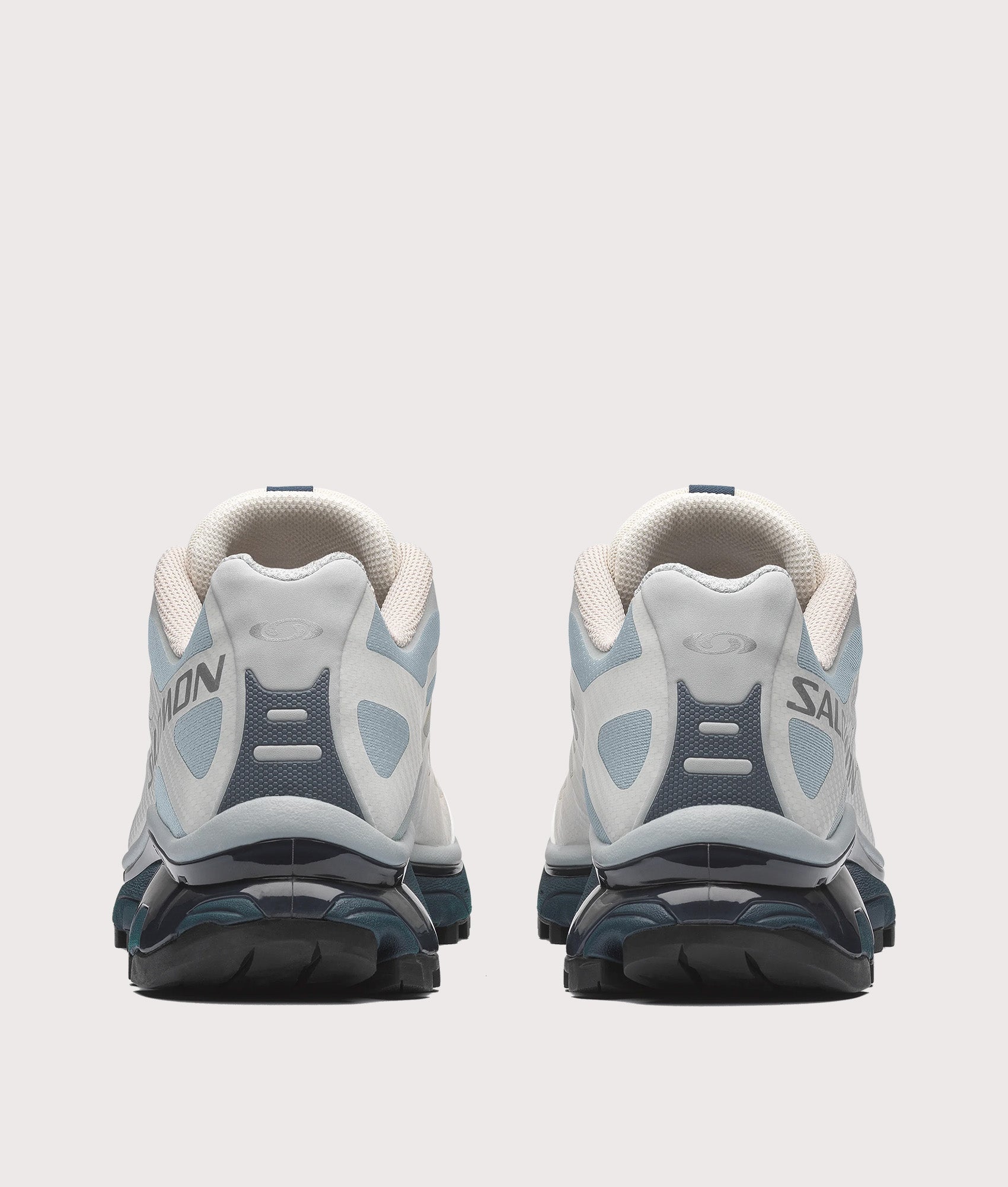 Salomon XT-4 OG in Pearl Blue, Grisaille and Vanila at EQVVS Menswear. Back shot.