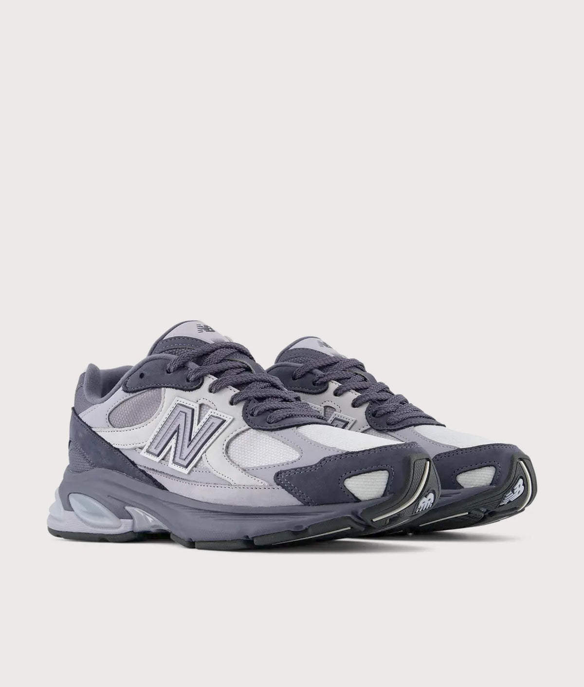 New Balance 2010 Sneakers in Meteorite and Digital Mist at EQVVS Menswear. Angled front shot.