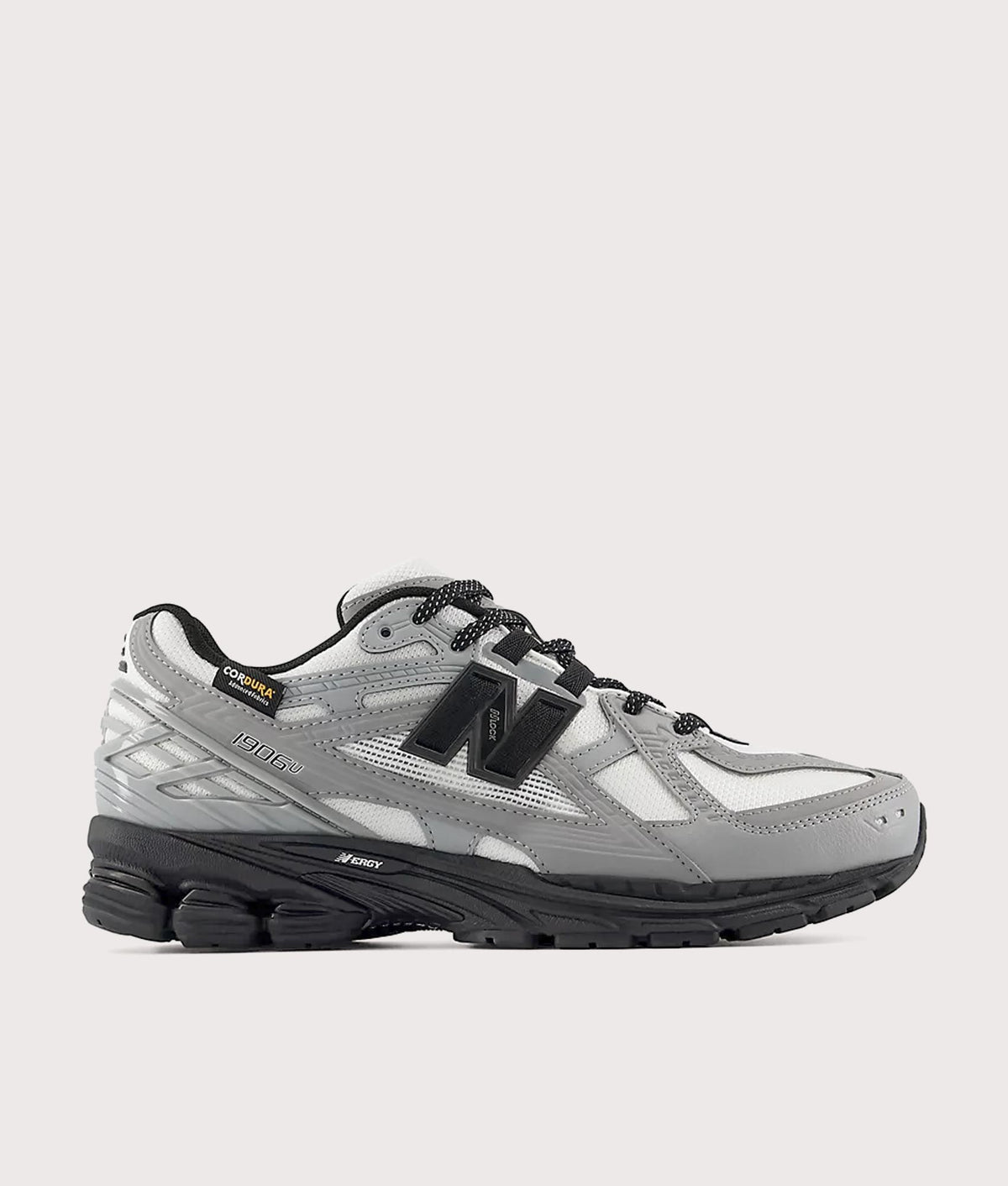 New Balance 1906N Sneakers in Slate Grey and Reflection at EQVVS Menswear. Side shot.