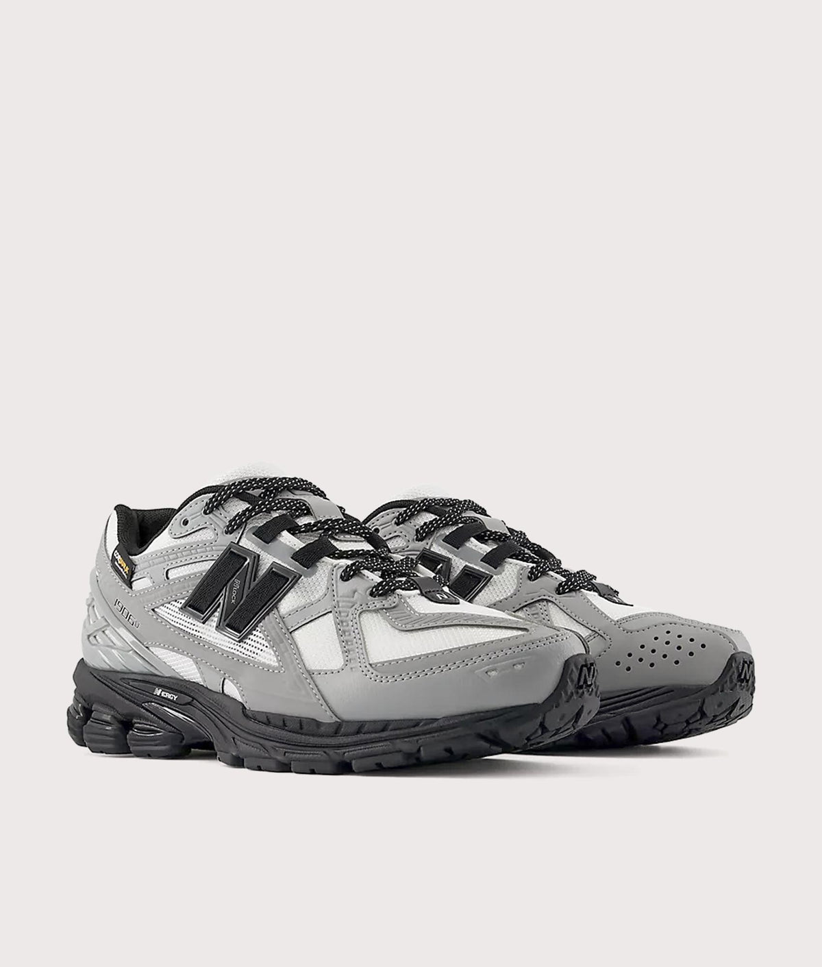 New Balance 1906N Sneakers in Slate Grey and Reflection at EQVVS Menswear. Angled front shot.