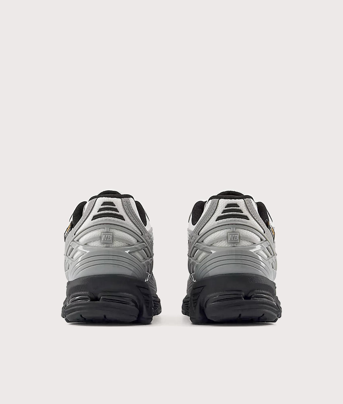 New Balance 1906N Sneakers in Slate Grey and Reflection at EQVVS Menswear. Back shot.