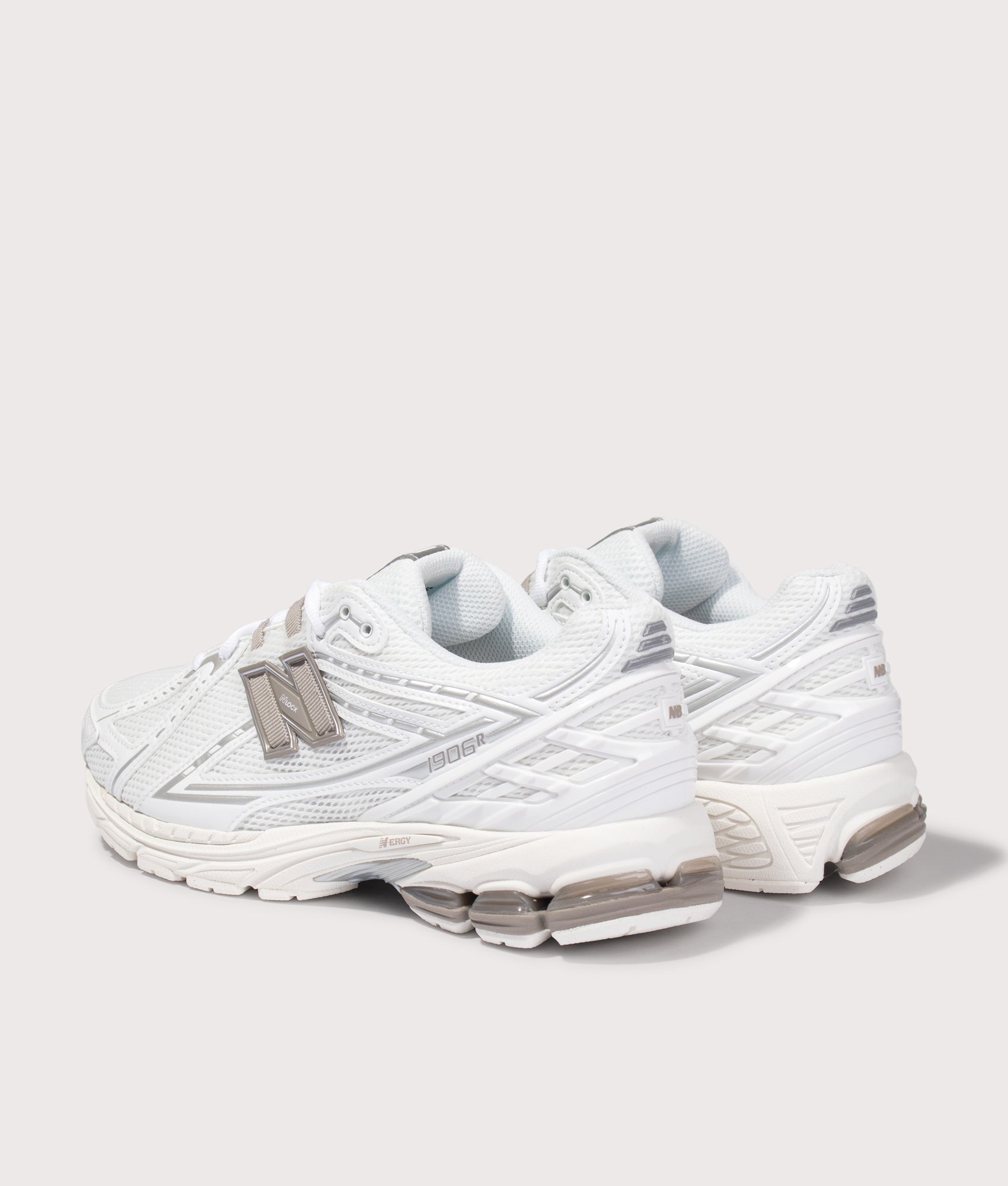 New Balance 1906 Sneakers in White at EQVVS Menswear. Angled back shot.