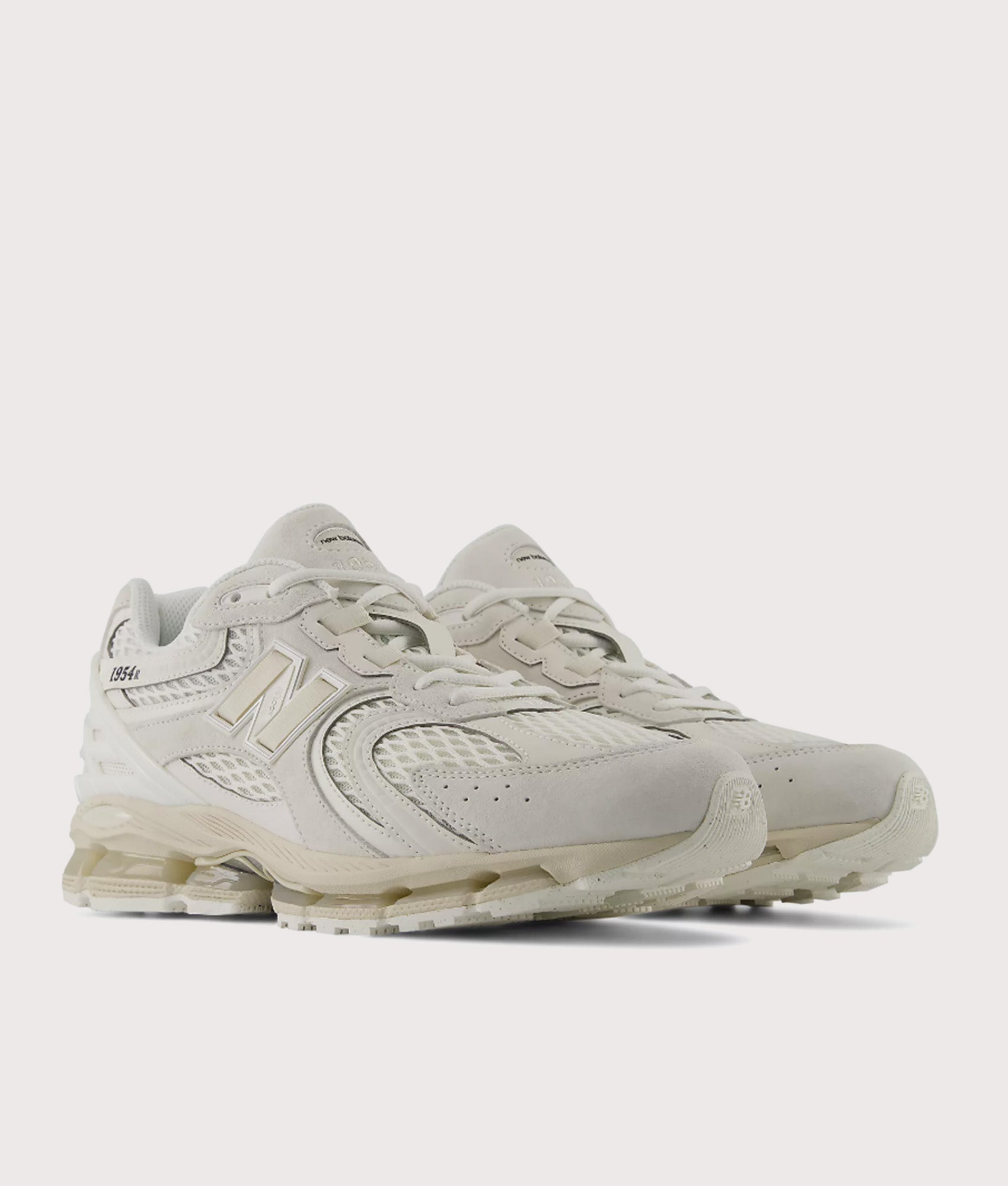 New Balance 1954R Sneakers in Sea Salt and Linen at EQVVS Menswear. Angled front shot.