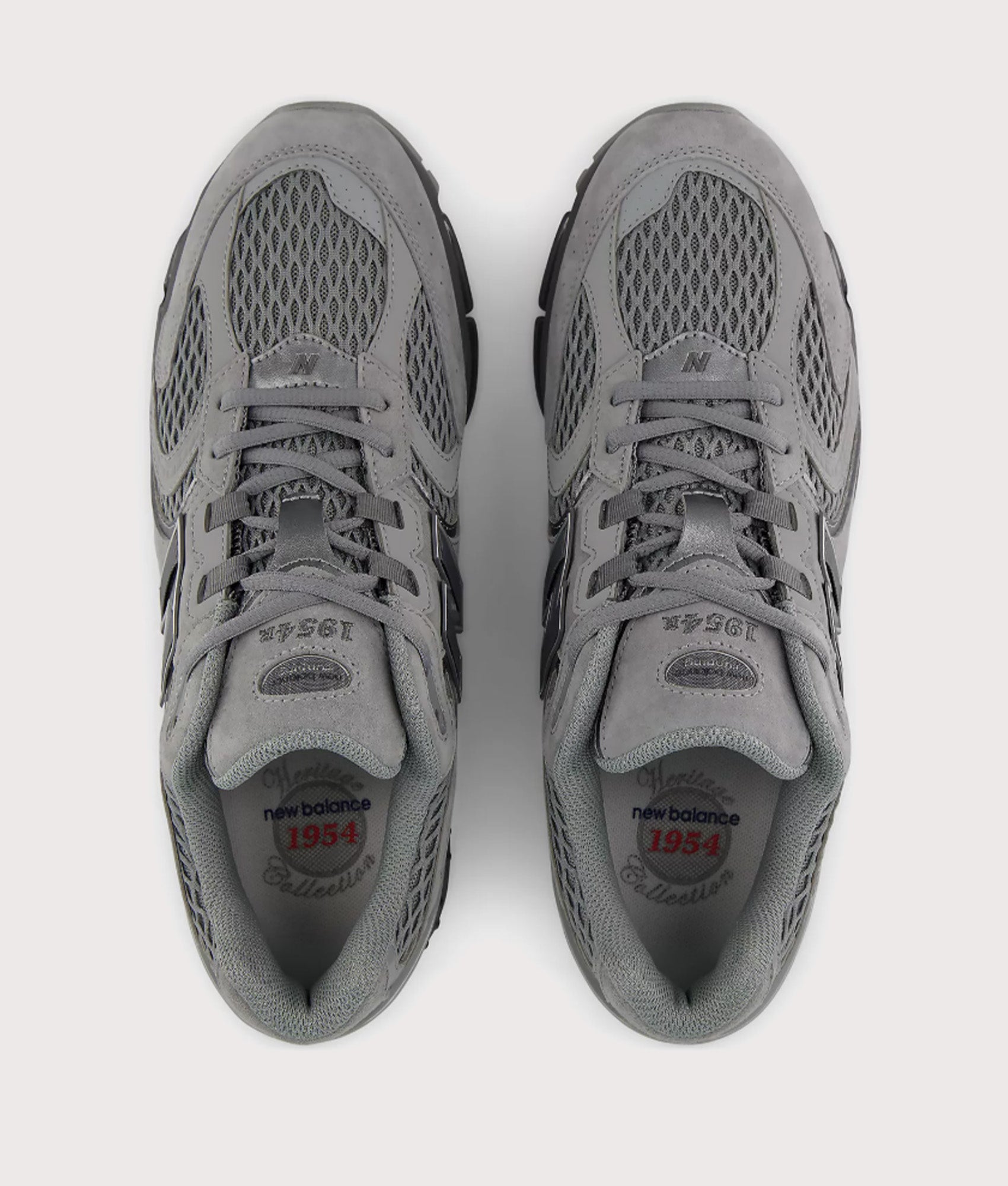 New Balance 1954R Sneakers in Slate Grey and Castlerock at EQVVS Menswear. Top shot.