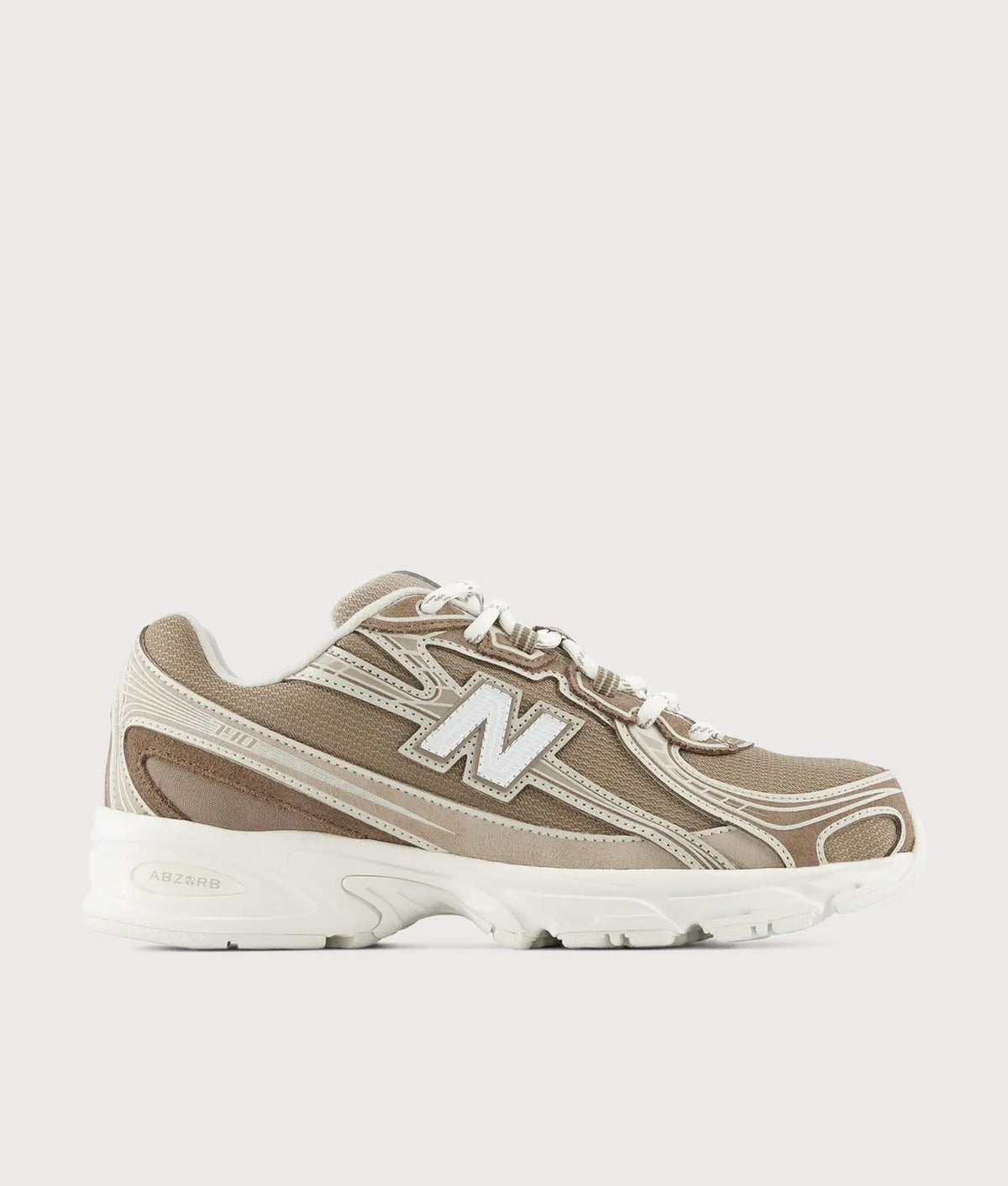 New Balance 740 Sneakers in Mushroom and Driftwood at EQVVS Menswear. Side shot.