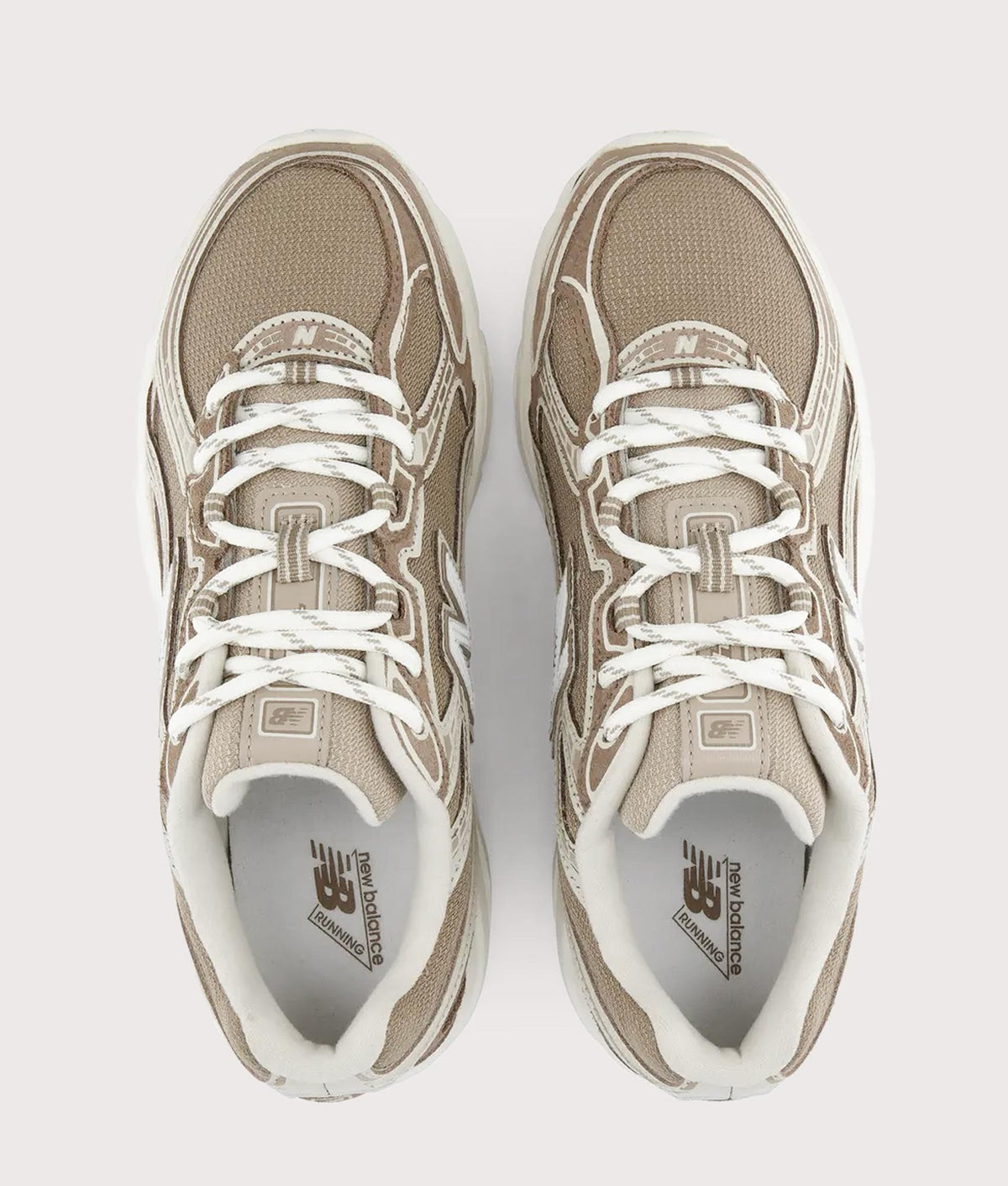 New Balance 740 Sneakers in Mushroom and Driftwood at EQVVS Menswear. Tread shot.