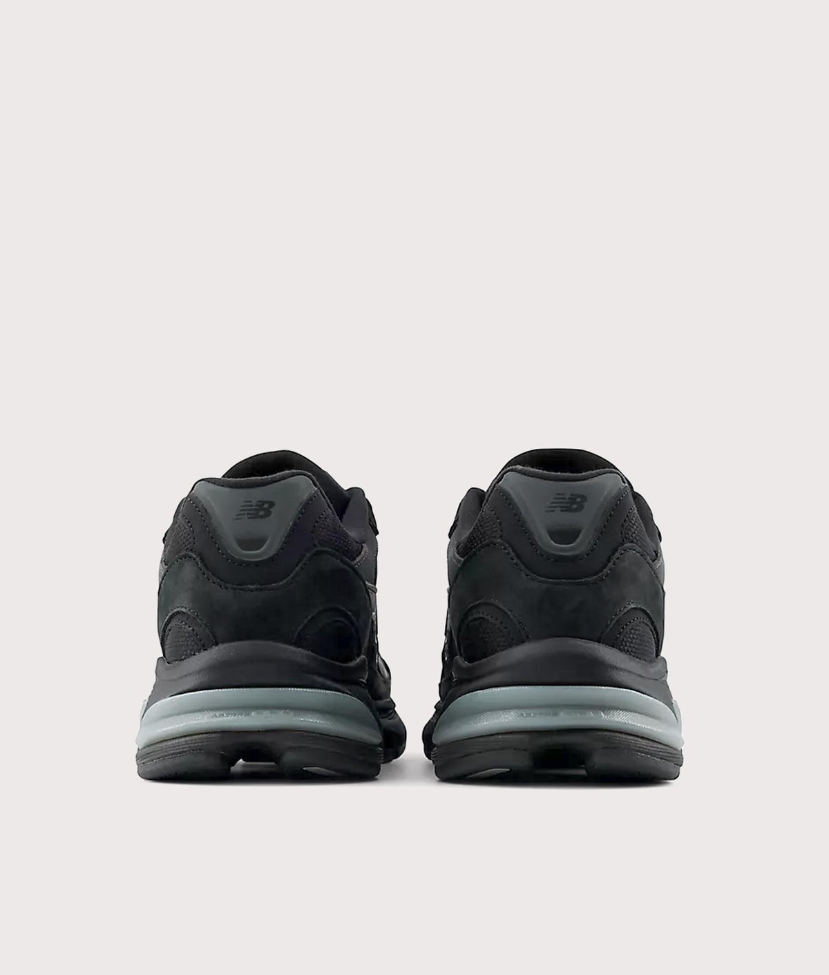 New Balance 2010 Sneakers in Black and Harbor Grey at EQVVS Menswear. Back shot.