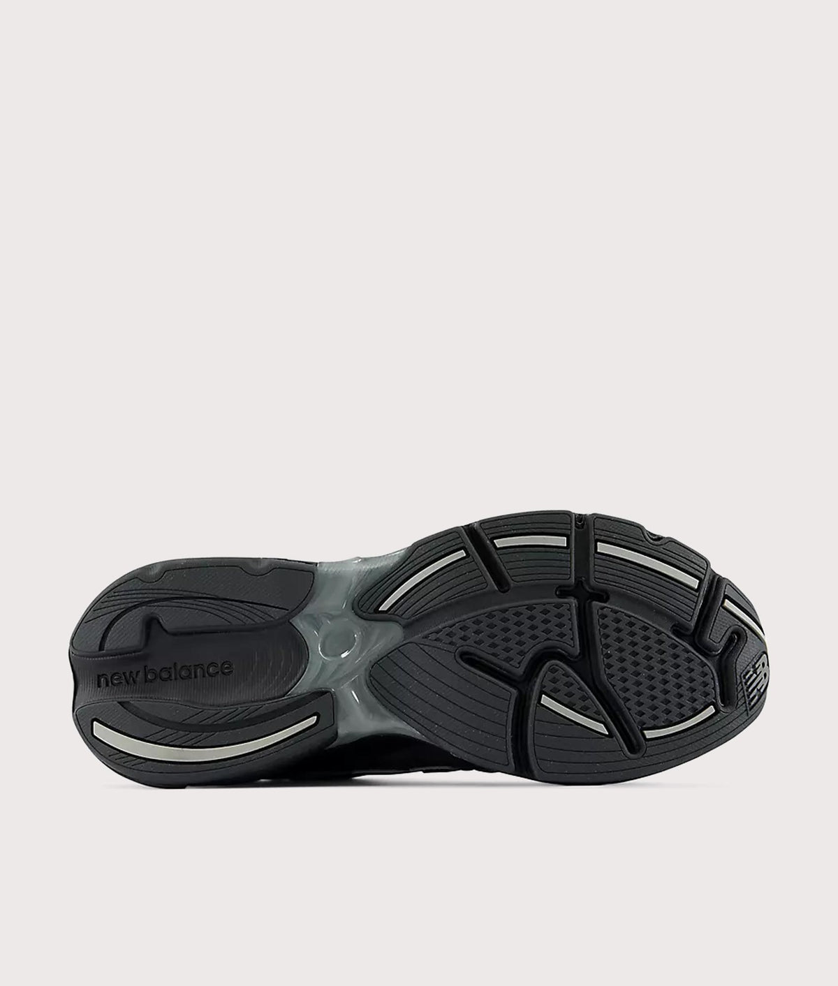 New Balance 2010 Sneakers in Black and Harbor Grey at EQVVS Menswear. Tread shot.