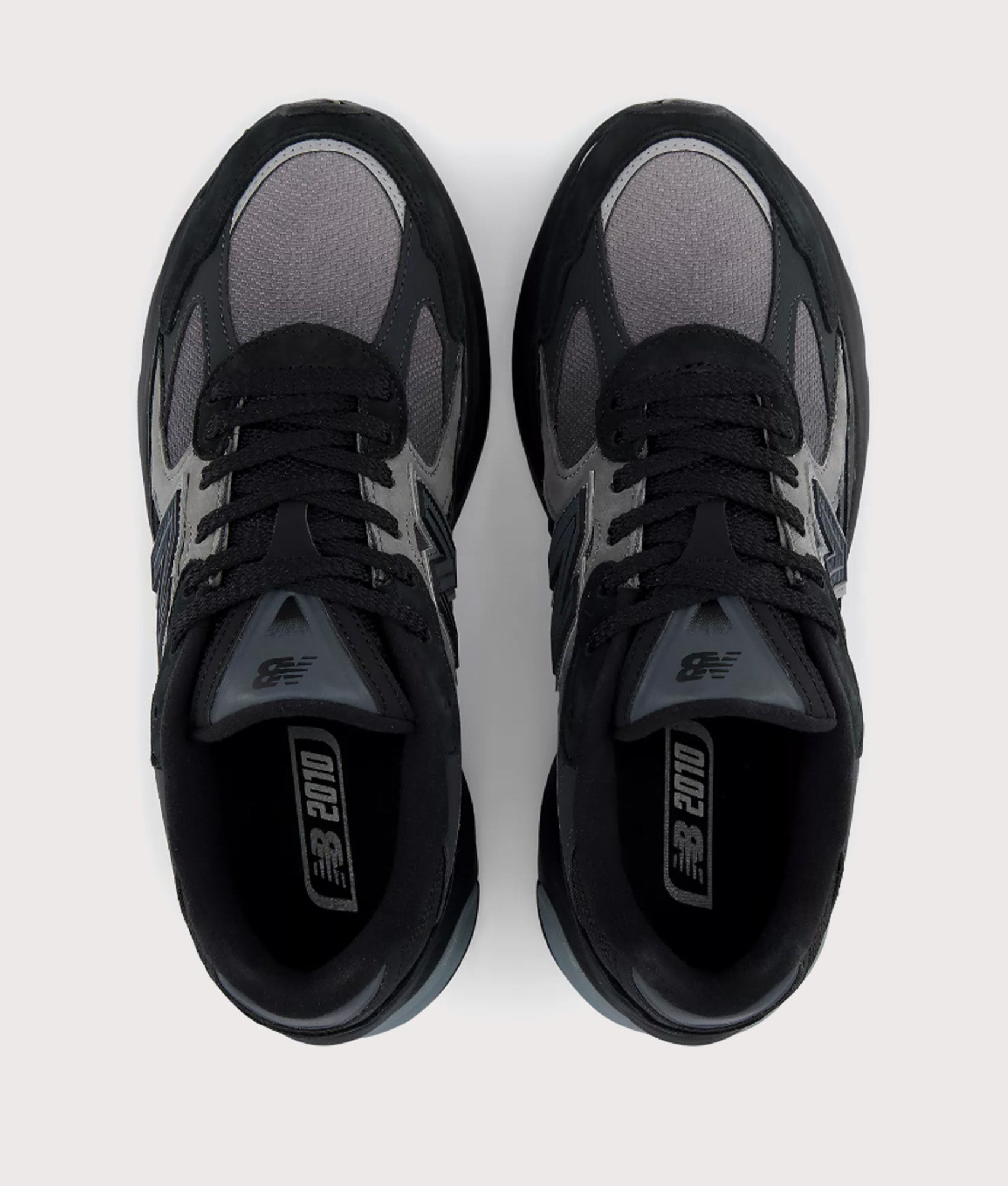 New Balance 2010 Sneakers in Black and Harbor Grey at EQVVS Menswear. Top shot.