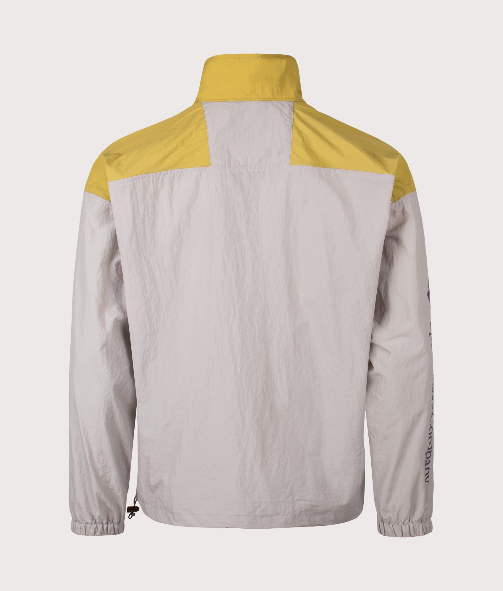 Columbia Riptide II Retro Windbreaker Anorak in Flint Grey, Peppercorn and Pink Agate at EQVVS Menswear. Back shot.