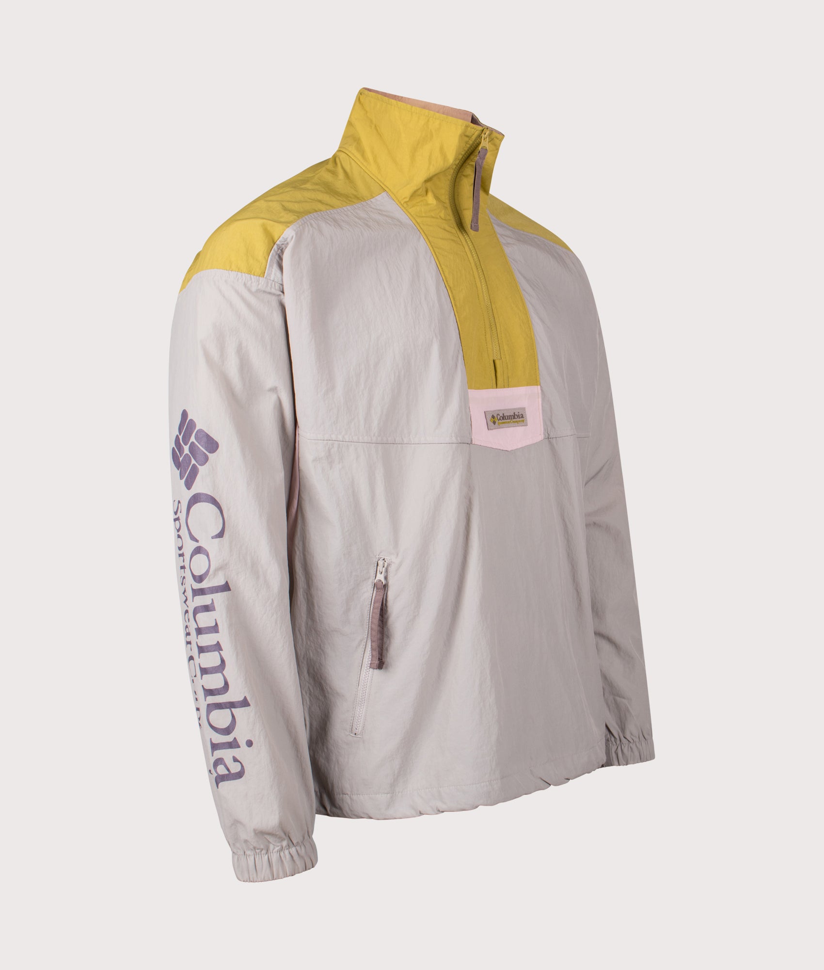 Columbia Riptide II Retro Windbreaker Anorak in Flint Grey, Peppercorn and Pink Agate at EQVVS Menswear. Angled front shot.