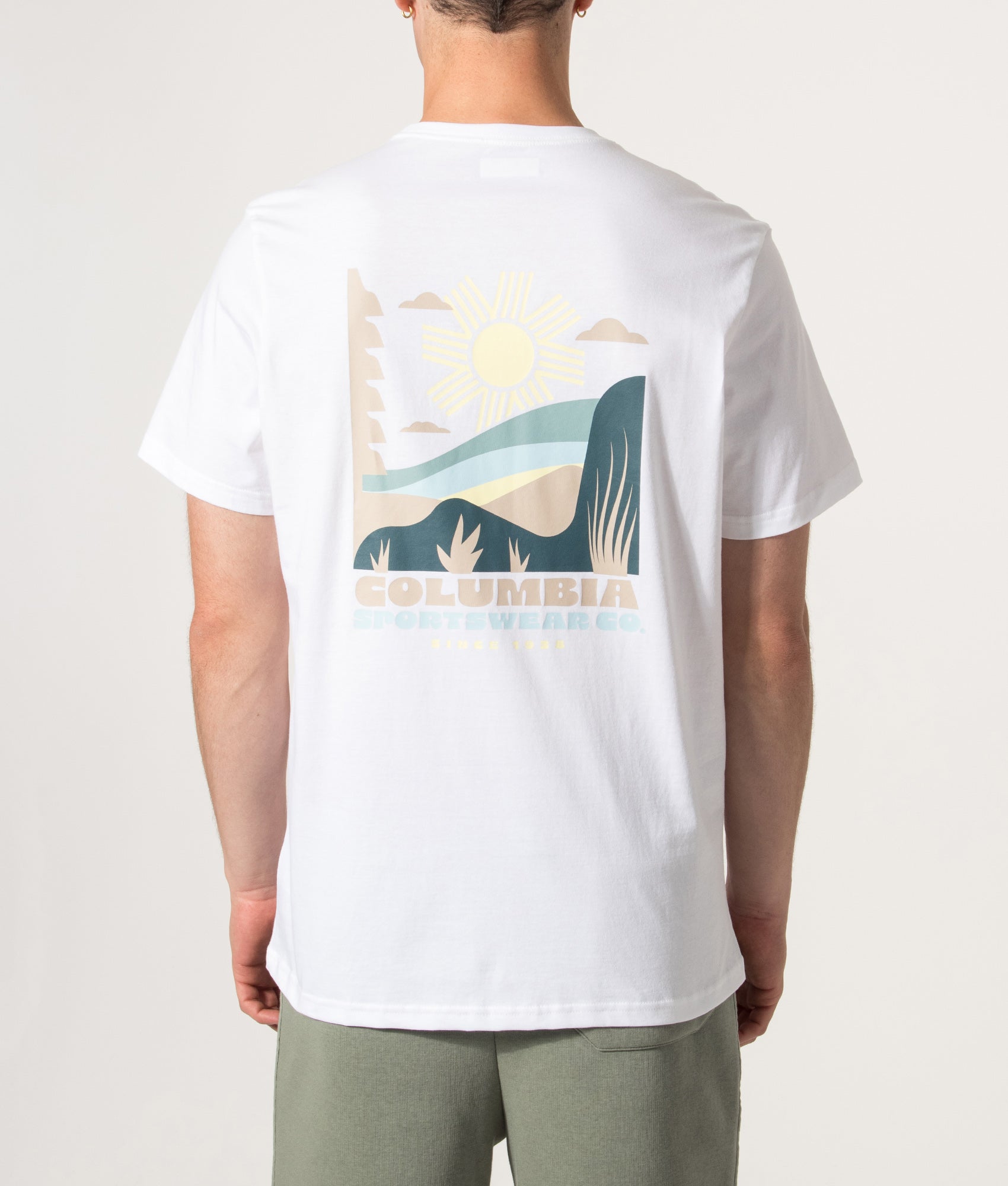 Columbia CSC Outdoor Back Graphic T-Shirt in White at EQVVS Menswear. Model back shot.