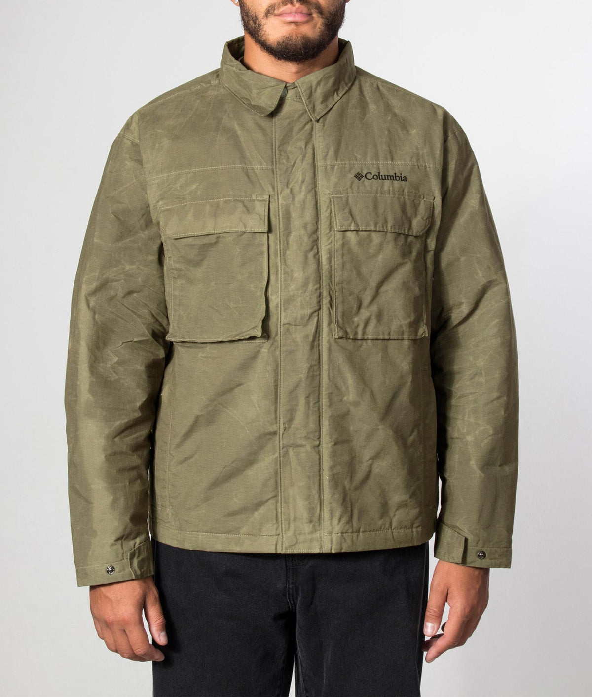 Columbia Timberline Tough Jacket in Stone Green at EQVVS Menswear. Model front shot.
