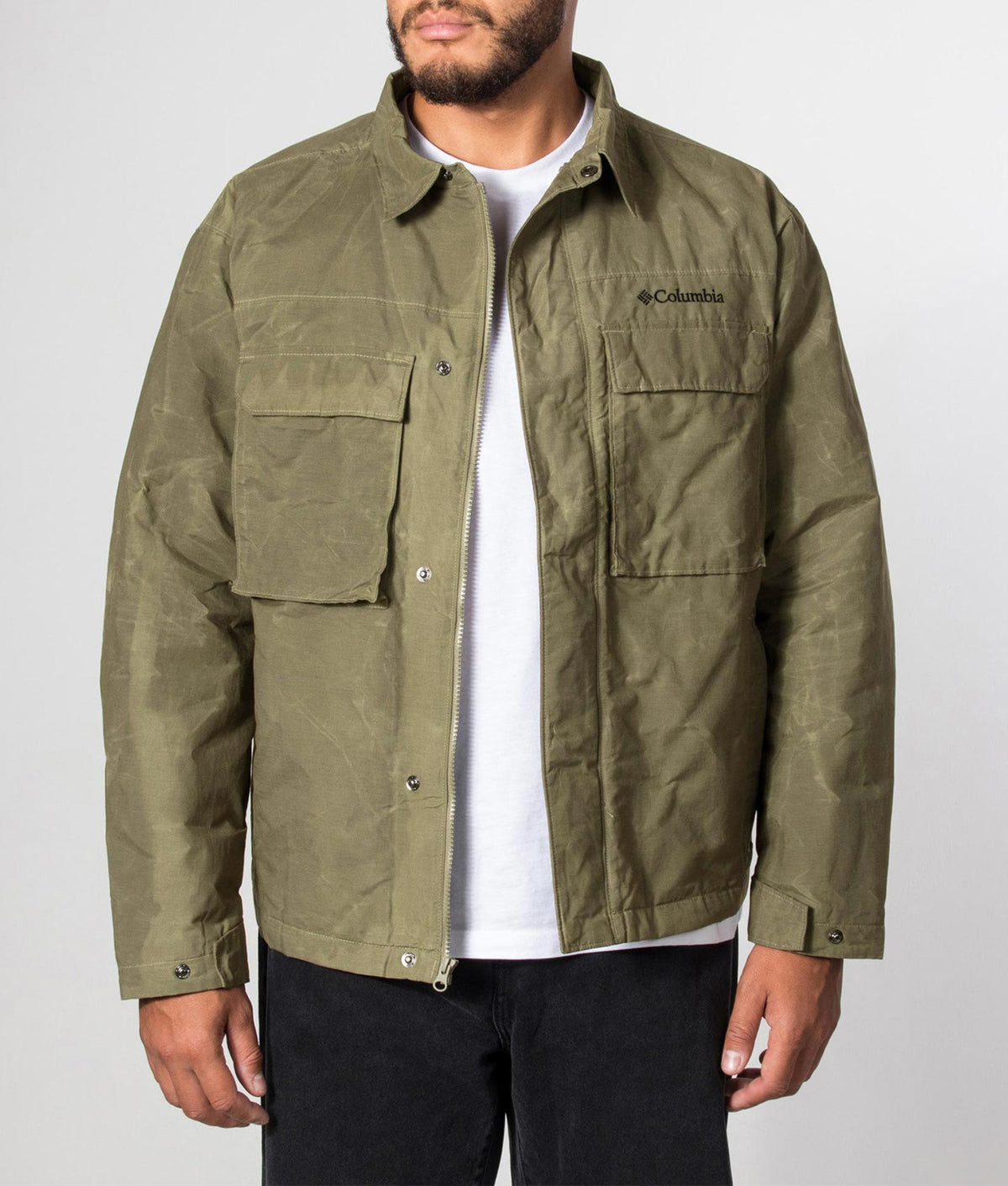 Columbia Timberline Tough Jacket in Stone Green at EQVVS Menswear. Model front shot.