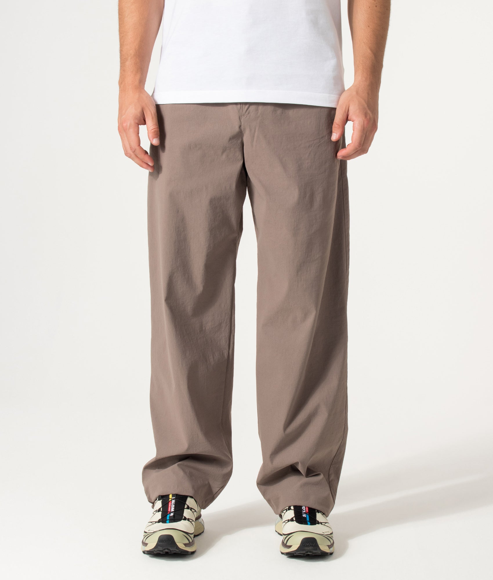 Columbia Relaxed Fit Grave Creek™ Tech Chinos in Iron at EQVVS Menswear. Model front shot.