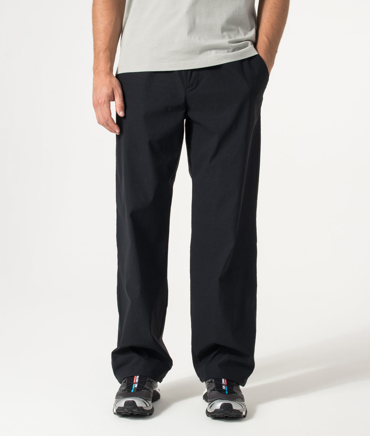 Columbia Relaxed Fit Grave Creek™ Tech Chinos in Black at EQVVS Menswear. Model front shot.
