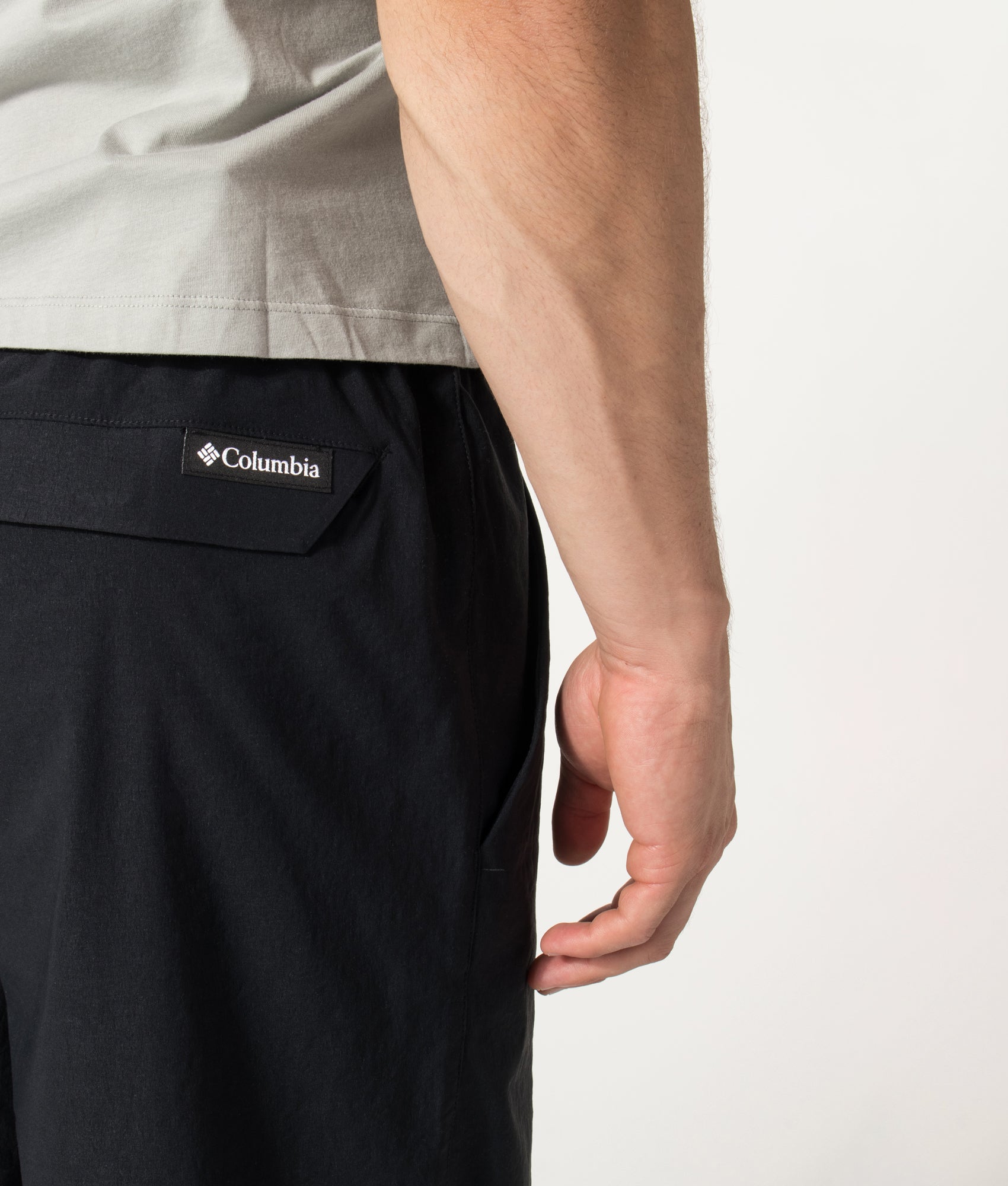 Columbia Relaxed Fit Grave Creek™ Tech Chinos in Black at EQVVS Menswear. Detail shot.