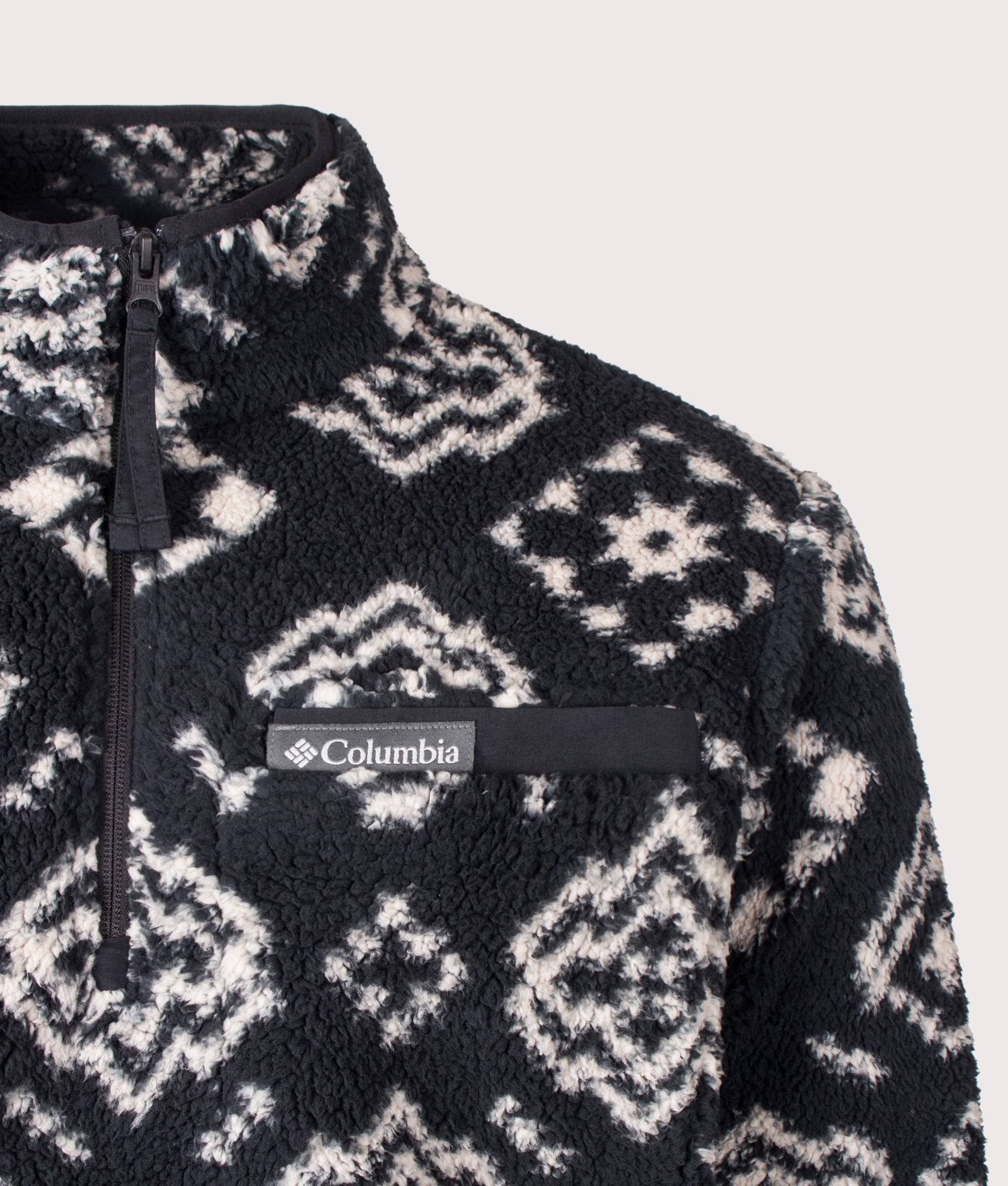 Columbia Regular Fit Rugged Ridge™ High Pile Quarter Zip Fleece in Black Checked Out and Black at EQVVS Menswear. Detail shot.