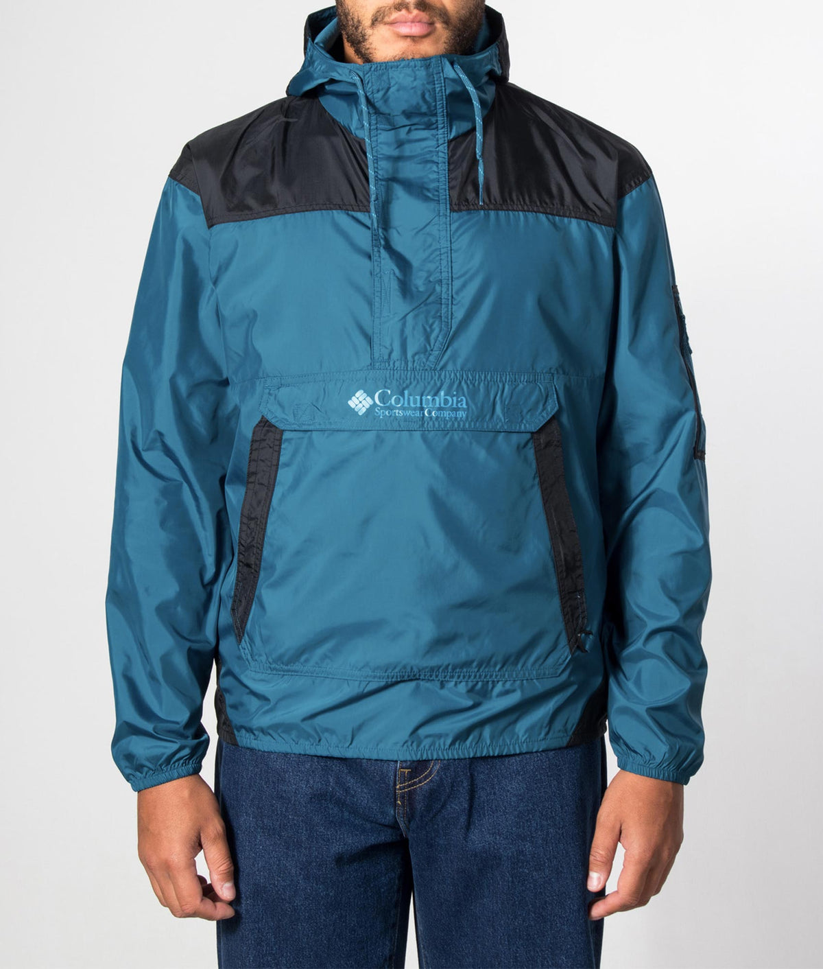 Columbia Regular Fit Challenger II Windbreaker in Phoenix Blue and Black at EQVVS Menswear. Model front shot.