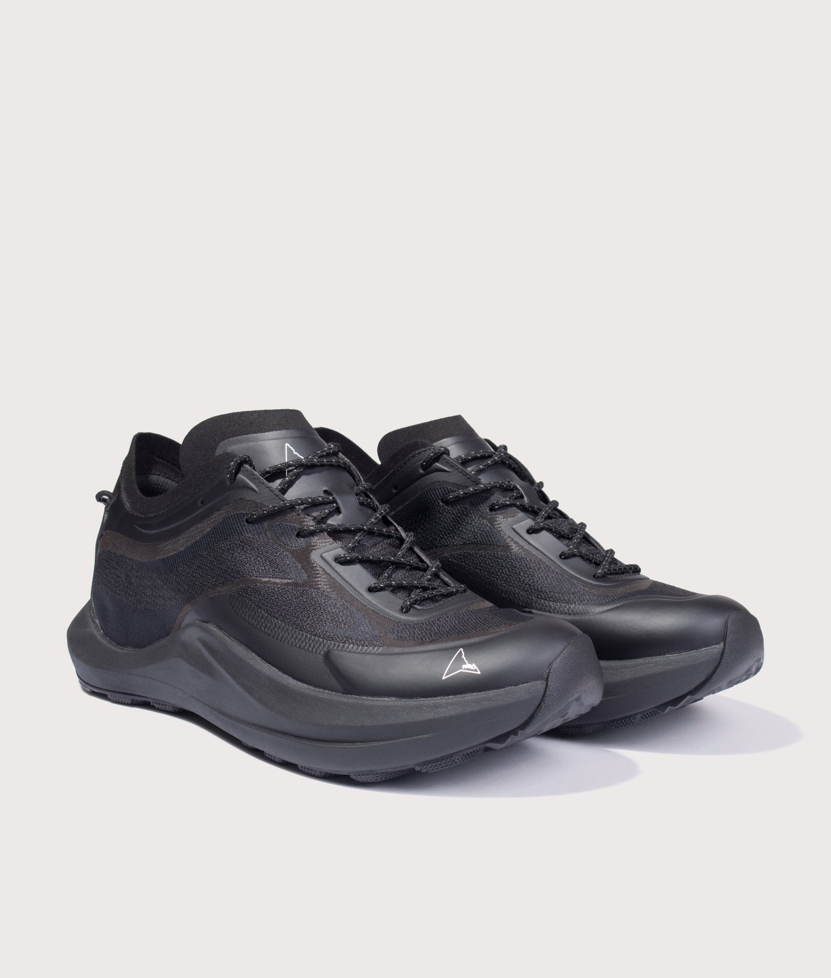 ROA Sella Trainers in Black at EQVVS Menswear. Angled front shot.