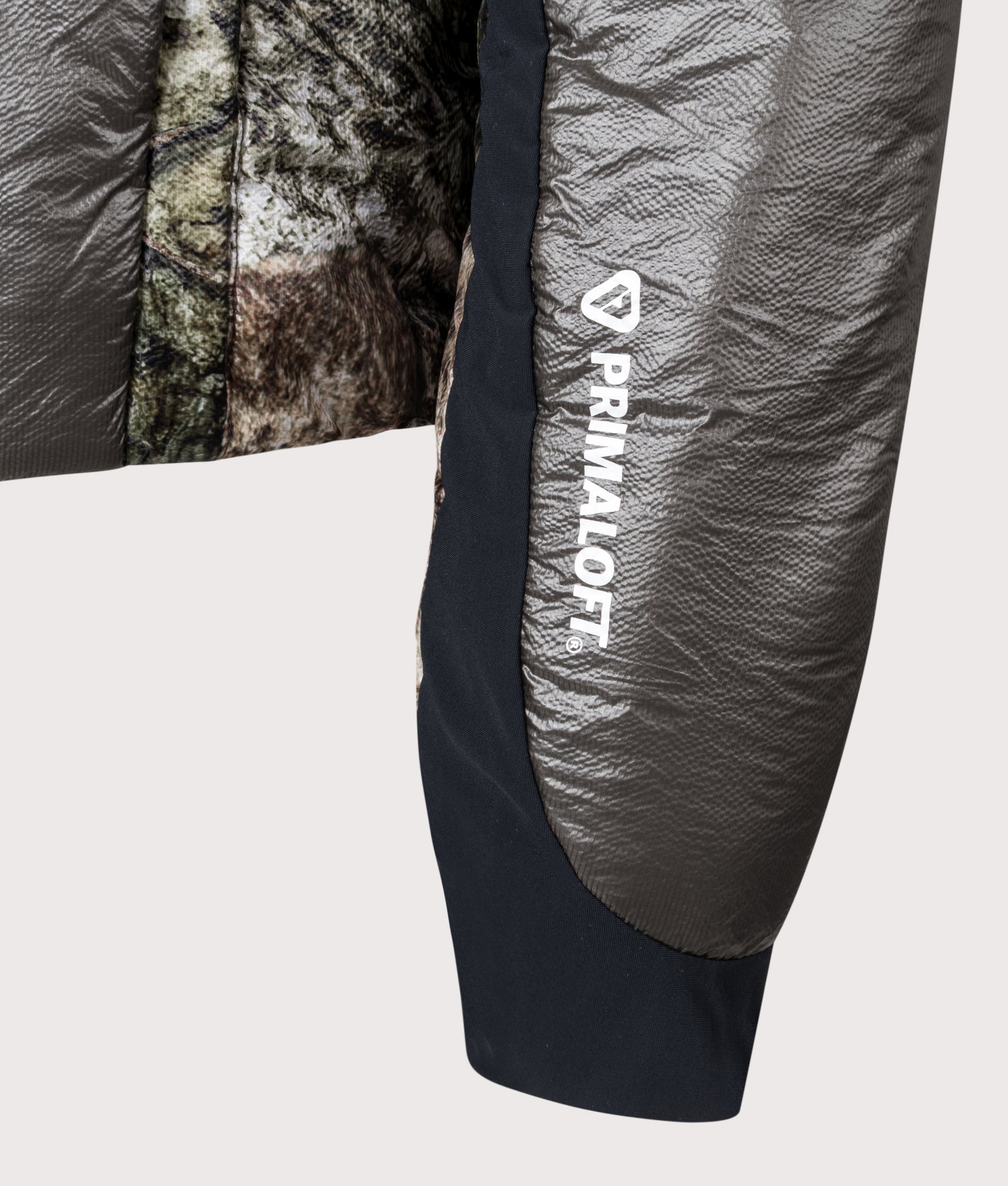 Hima Primaloft® Moth Print Insulated Synthetic Jacket in Anthracite by ROA. Shot by EQVVS. Sleeve detail shot.