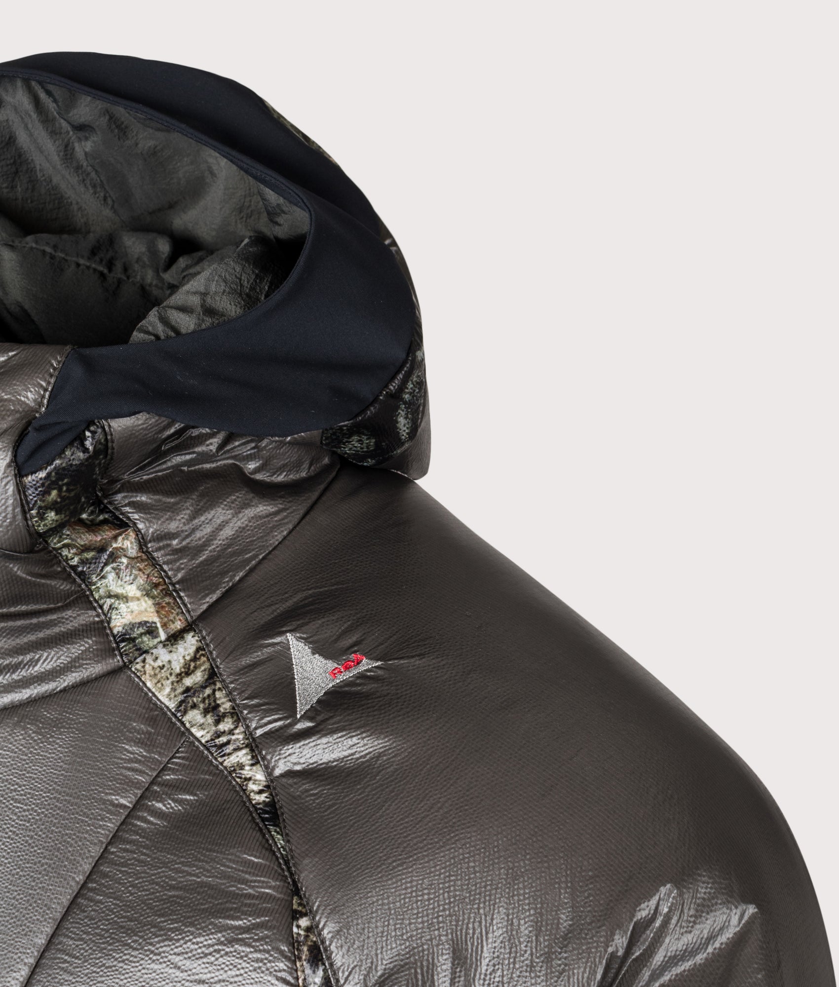 Hima Primaloft® Moth Print Insulated Synthetic Jacket in Anthracite by ROA. Shot by EQVVS. Detail shot.