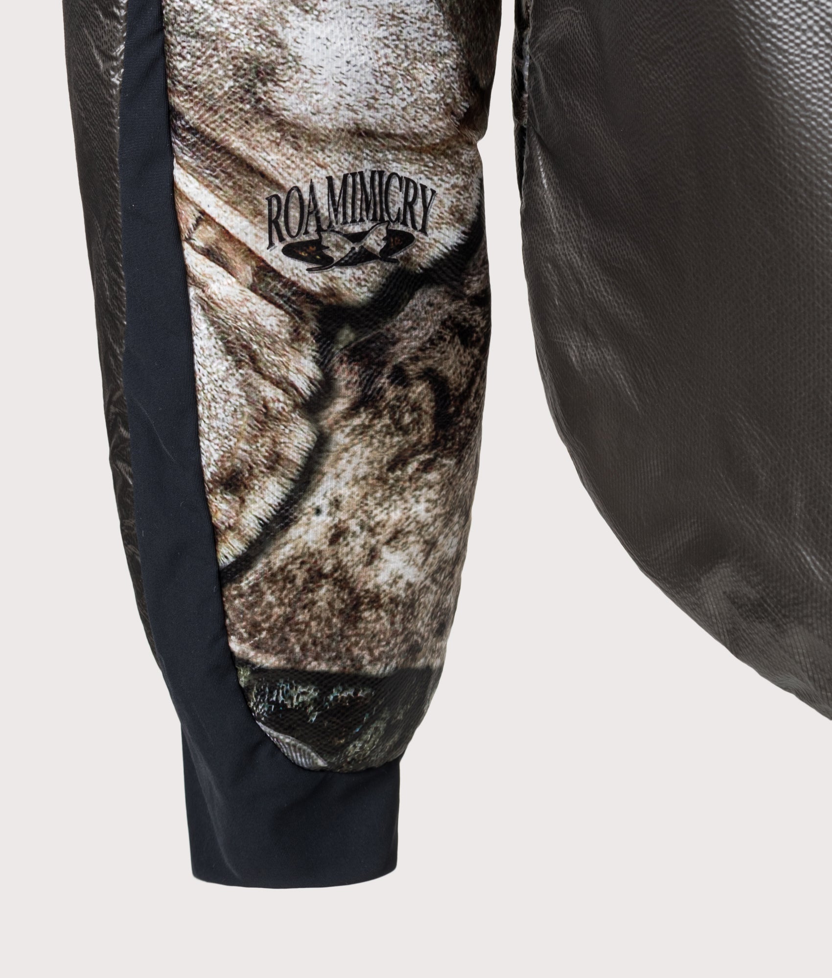 Hima Primaloft® Moth Print Insulated Synthetic Jacket in Anthracite by ROA. Shot by EQVVS. Back detail shot.
