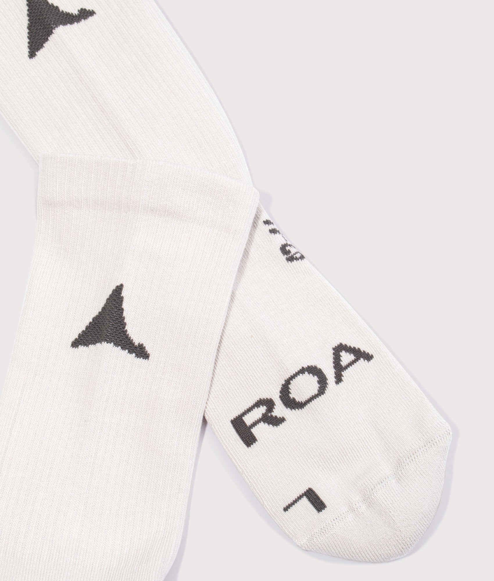 ROA Logo Biofil® Socks in Light Grey at EQVVS Menswear. Detail shot.