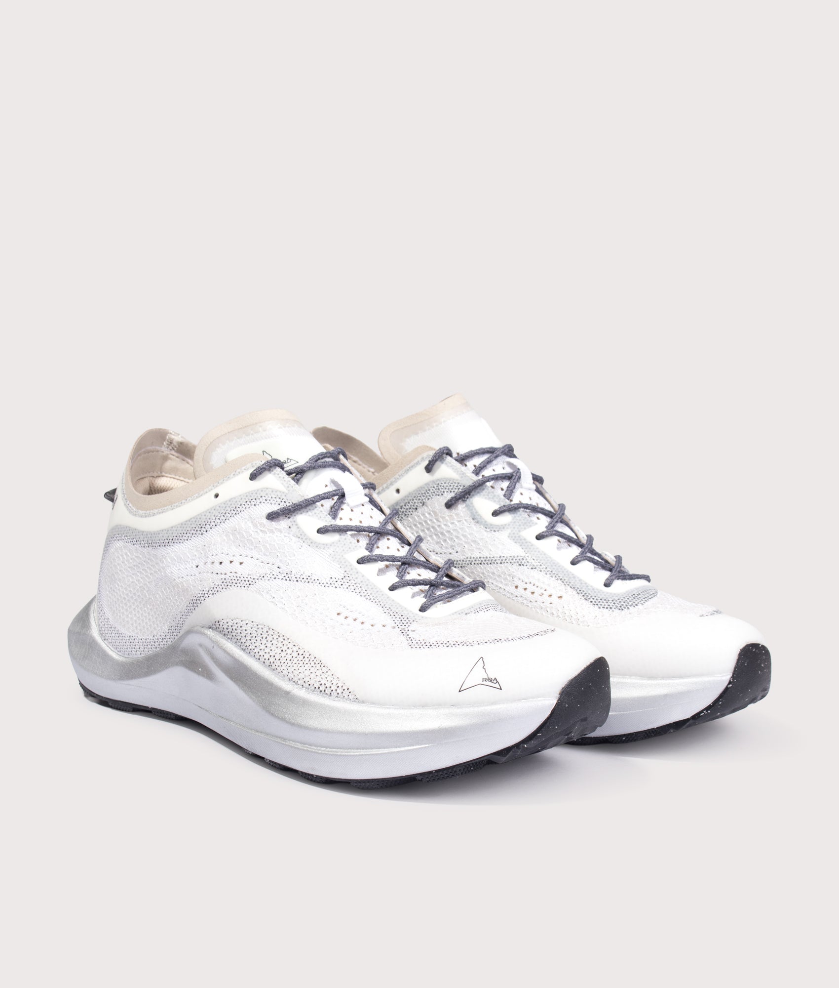 ROA Sella Lite Trainers in White at EQVVS Menswear. Angled front shot.