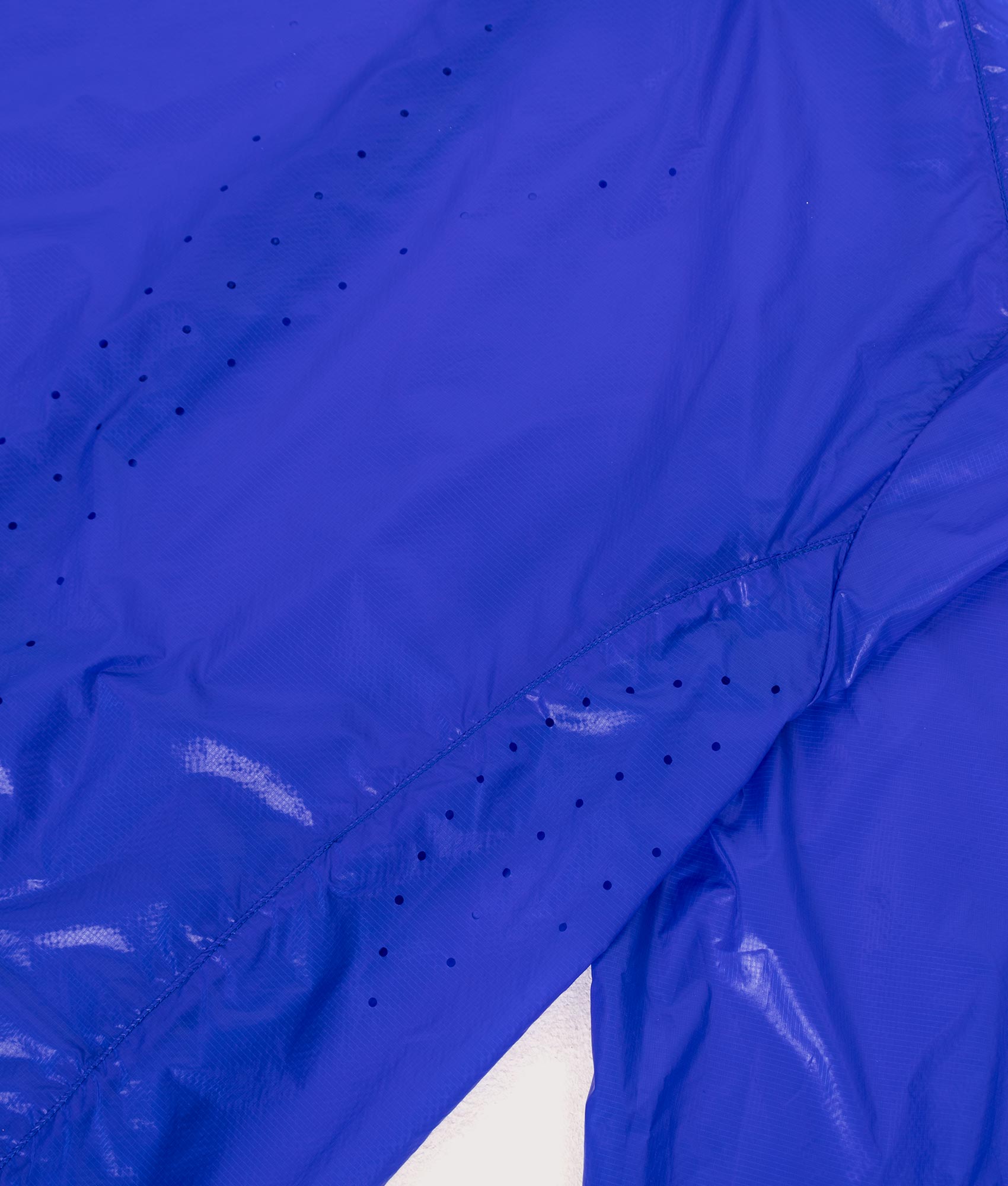 ROA Hue Packable Lightweight Windcheater in Blue at EQVVS Menswear. Third detail shot.